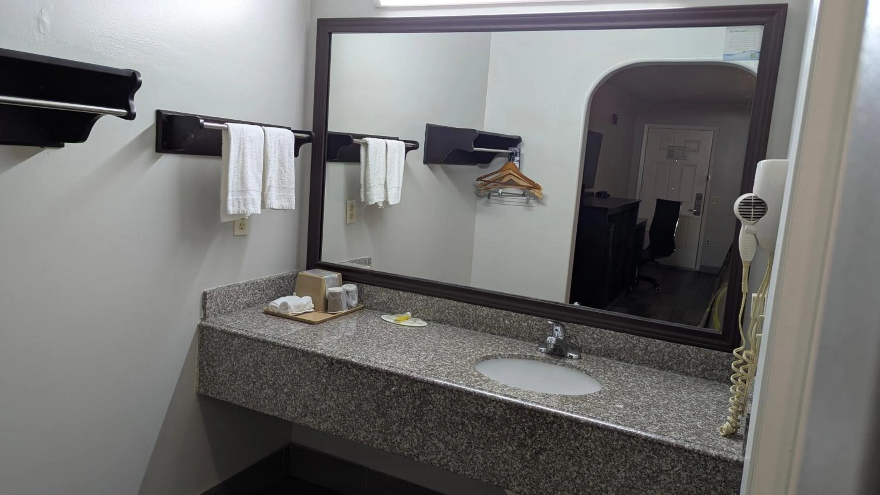 Bathroom in Super 8 by Wyndham Willowbrook Houston