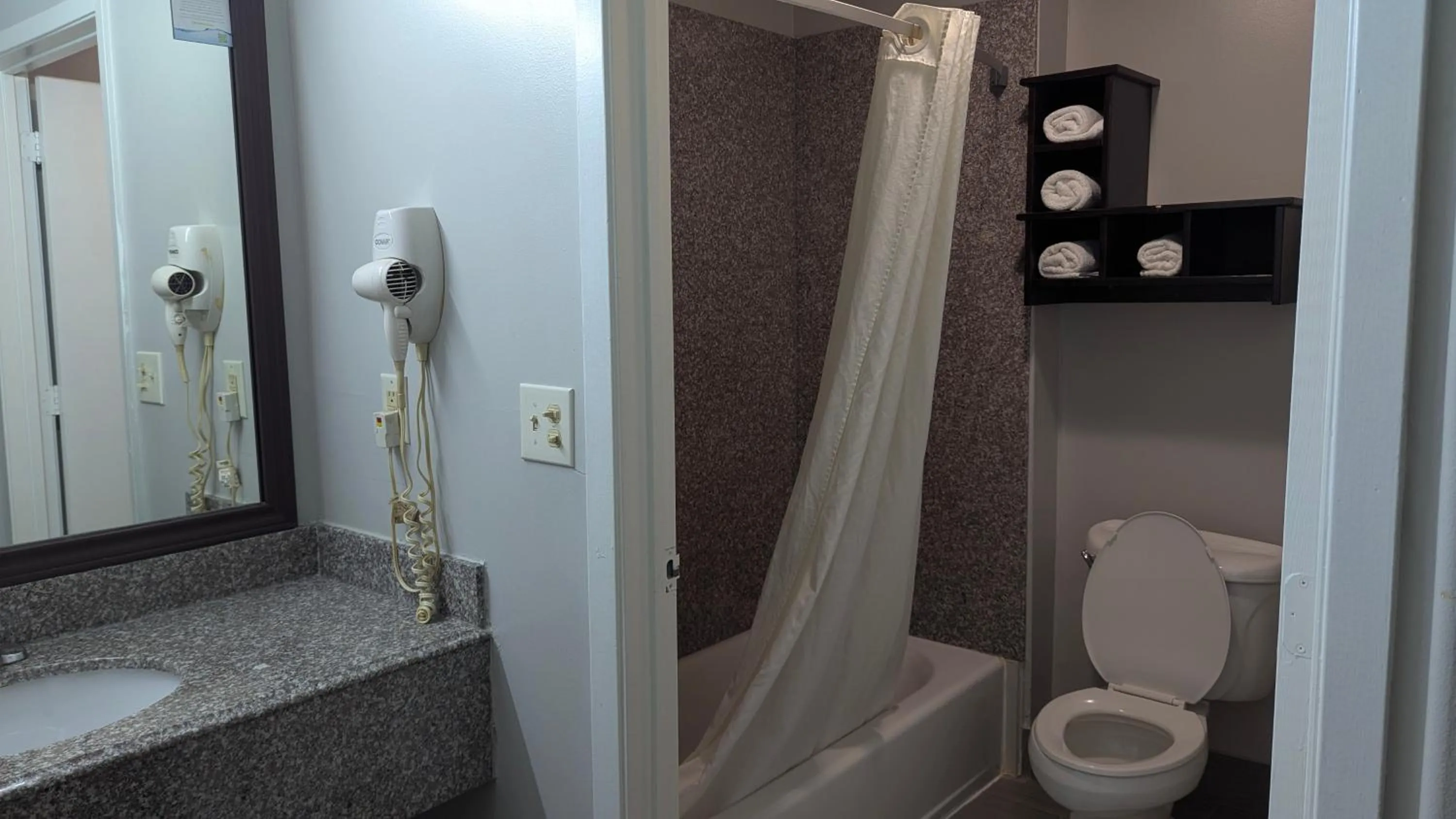 Bathroom in Super 8 by Wyndham Willowbrook Houston