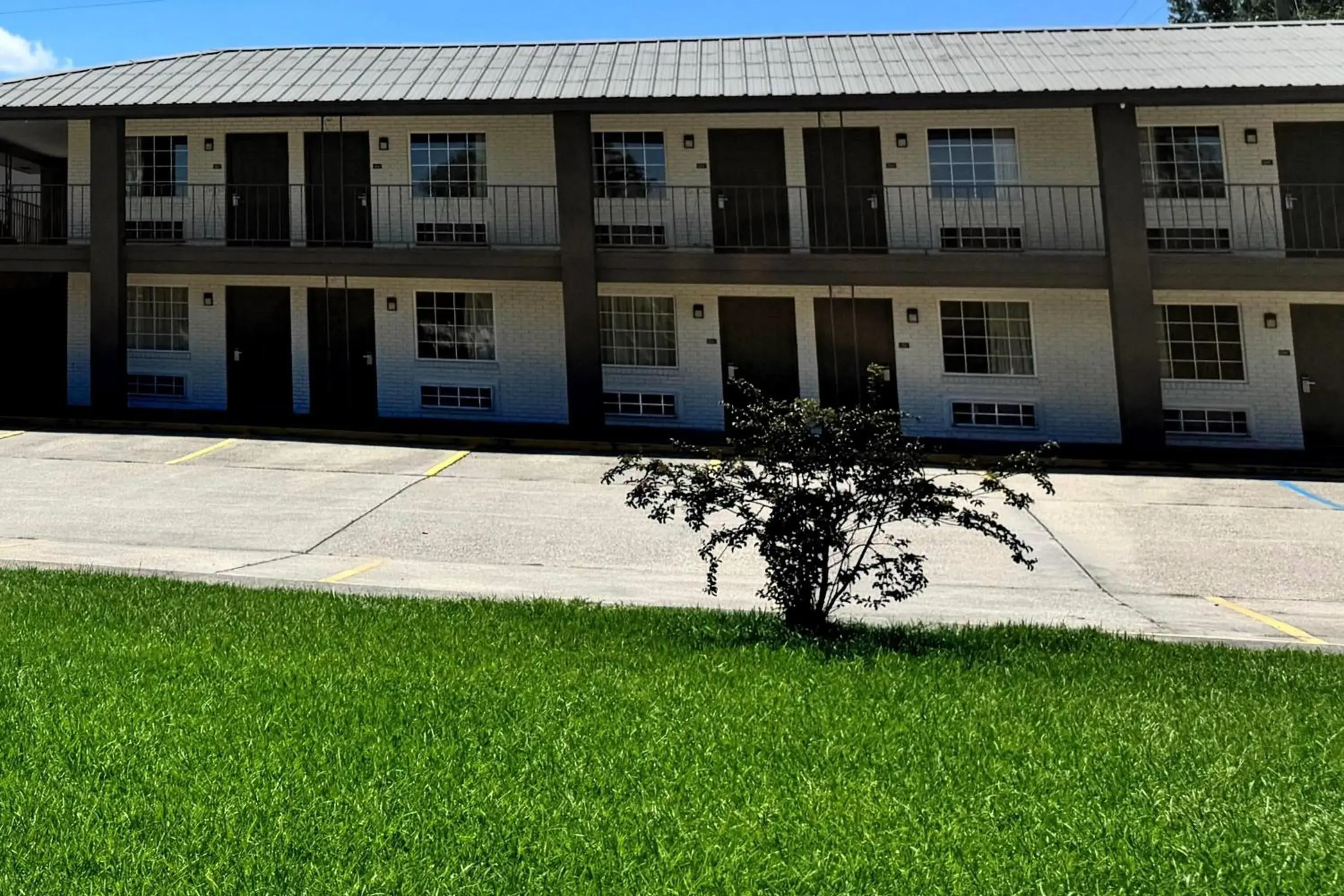 Property building in Super 8 by Wyndham Picayune Property building in Super 8 by Wyndham Picayune