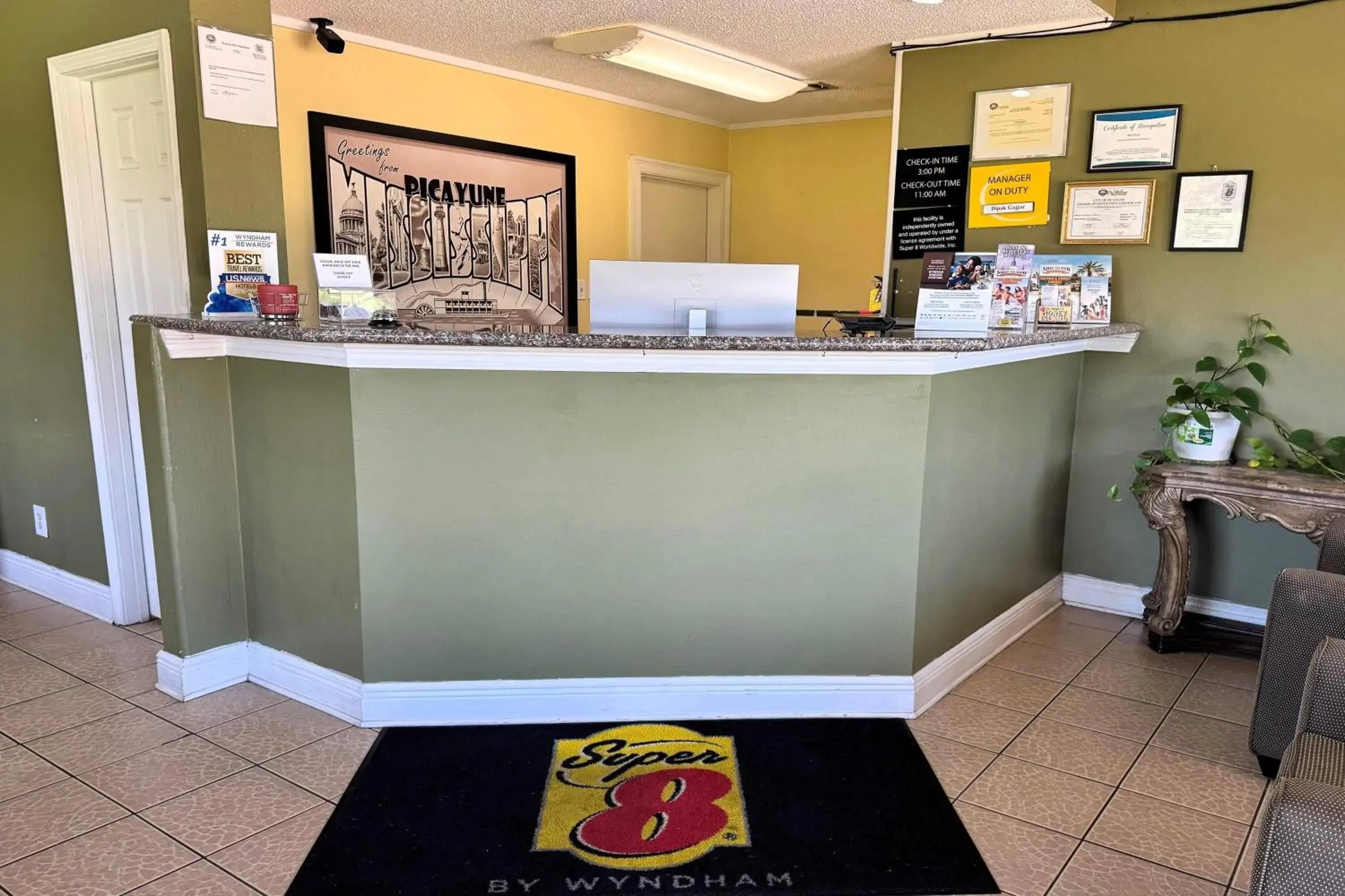 Lobby or reception in Super 8 by Wyndham Picayune Lobby or reception in Super 8 by Wyndham Picayune