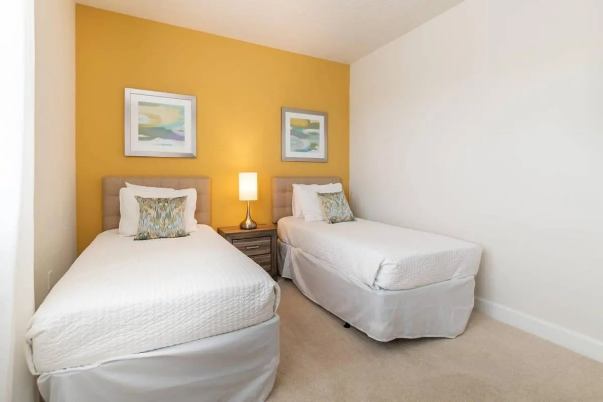 Bed in Ultimate Getaway - Your Best Vacation Home