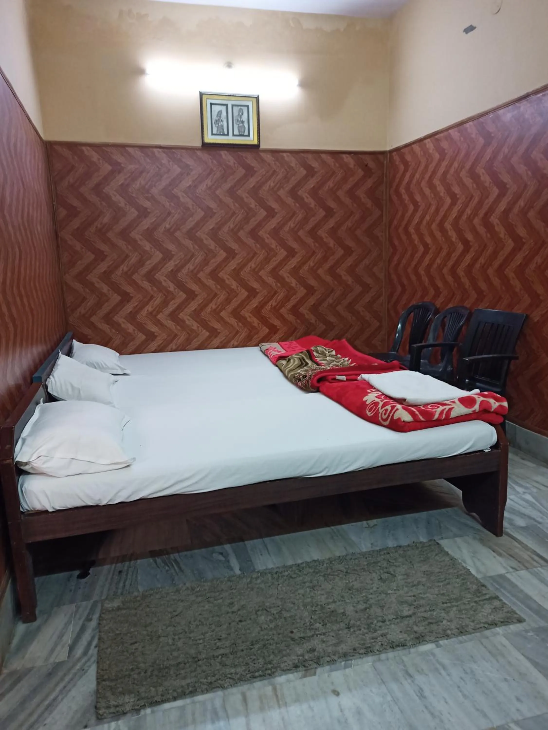 Bedroom in Teerth Guest House