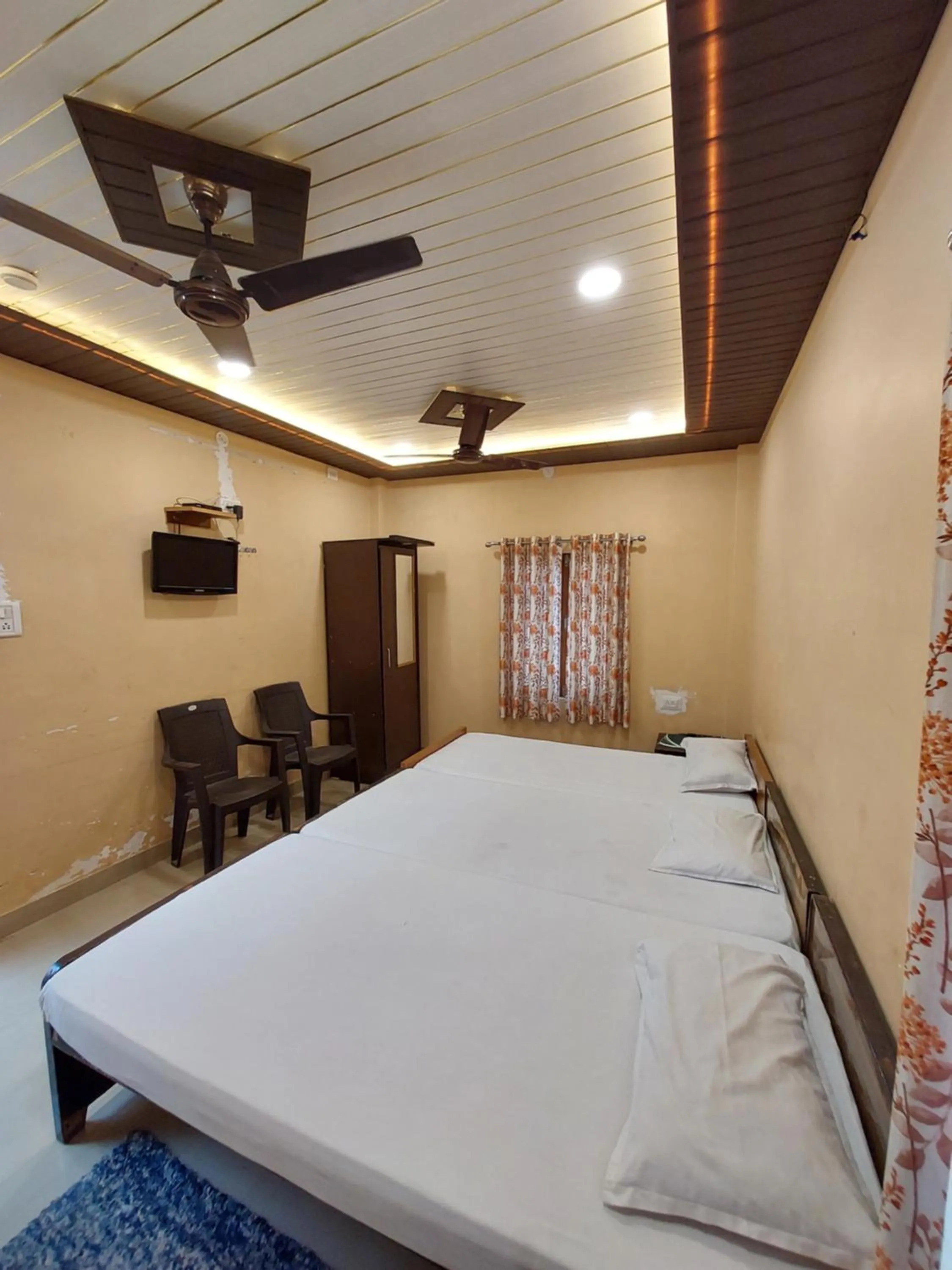 Bedroom in Teerth Guest House