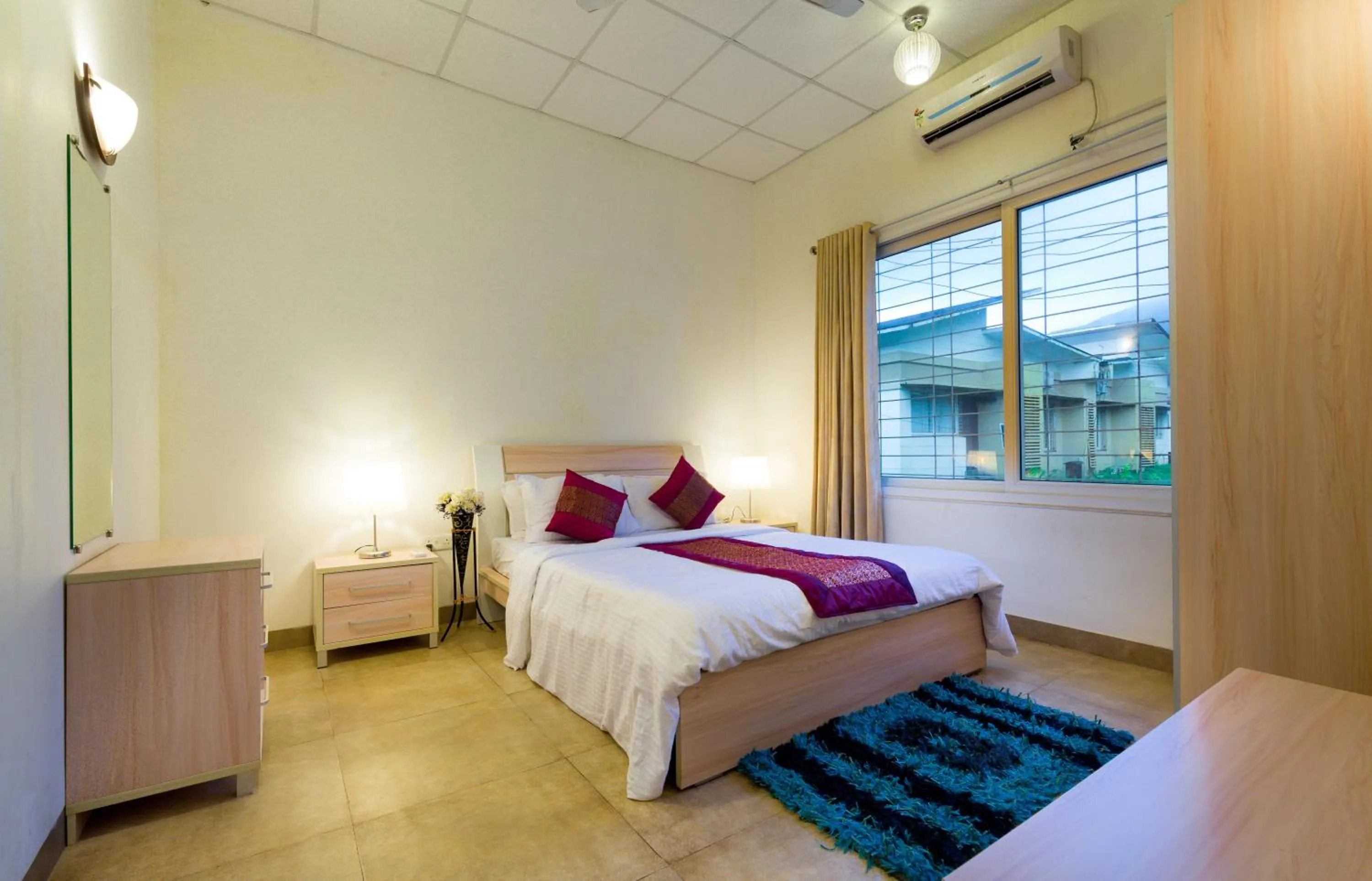 Photo of the whole room, Bed in Rainforest Resort and Spa, Igatpuri -Nature's Luxury Awaits