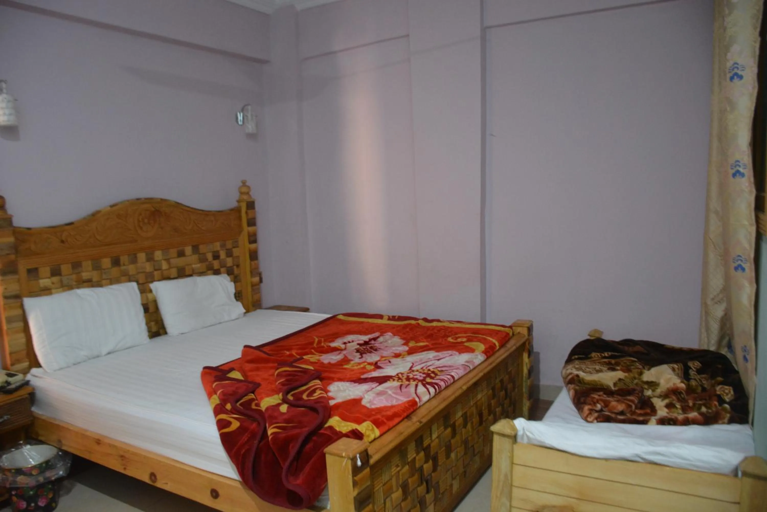 Bed in PC Green Hotel, Mahandri, Kaghan