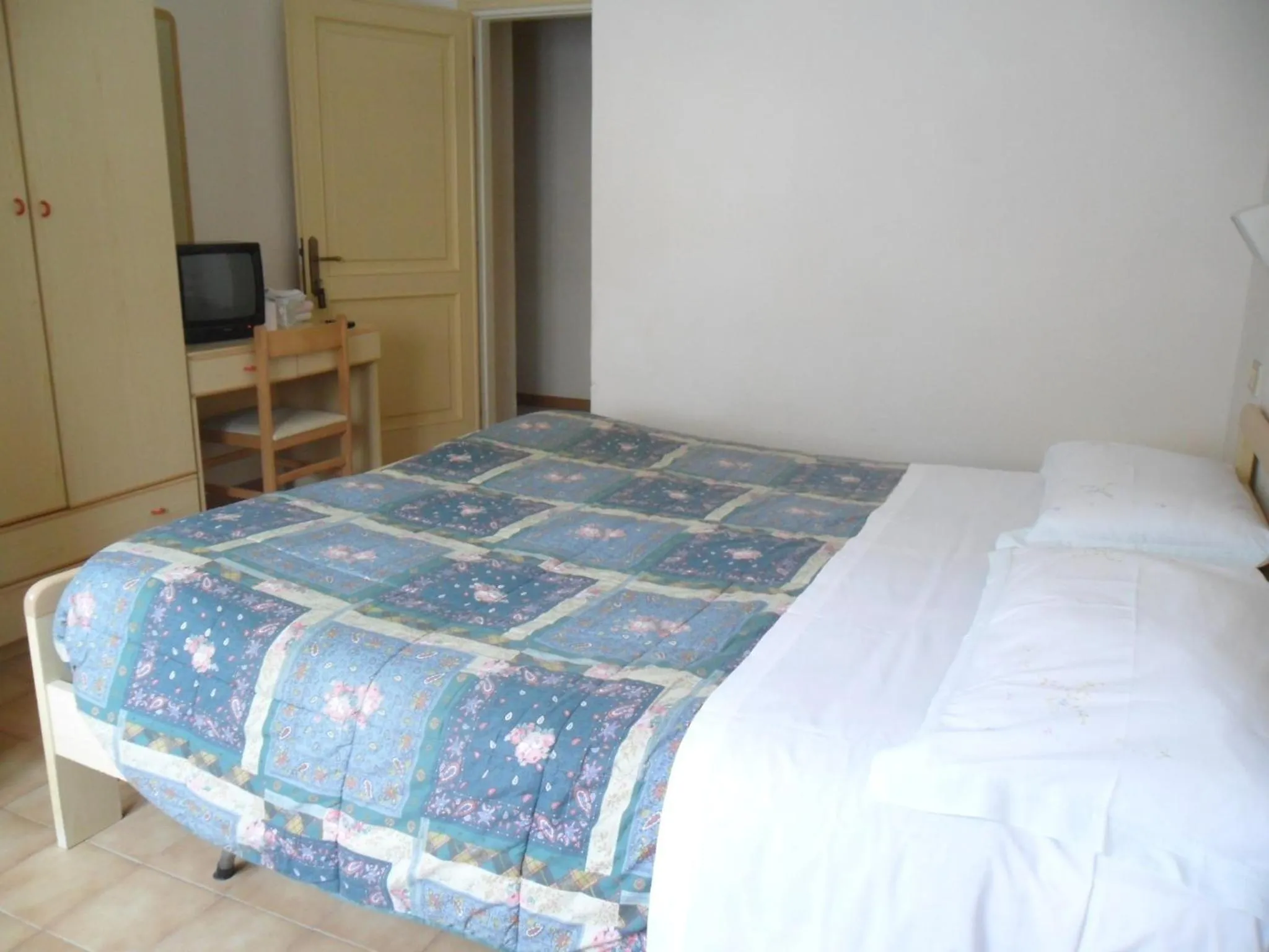 Bed in Albergo Giardino