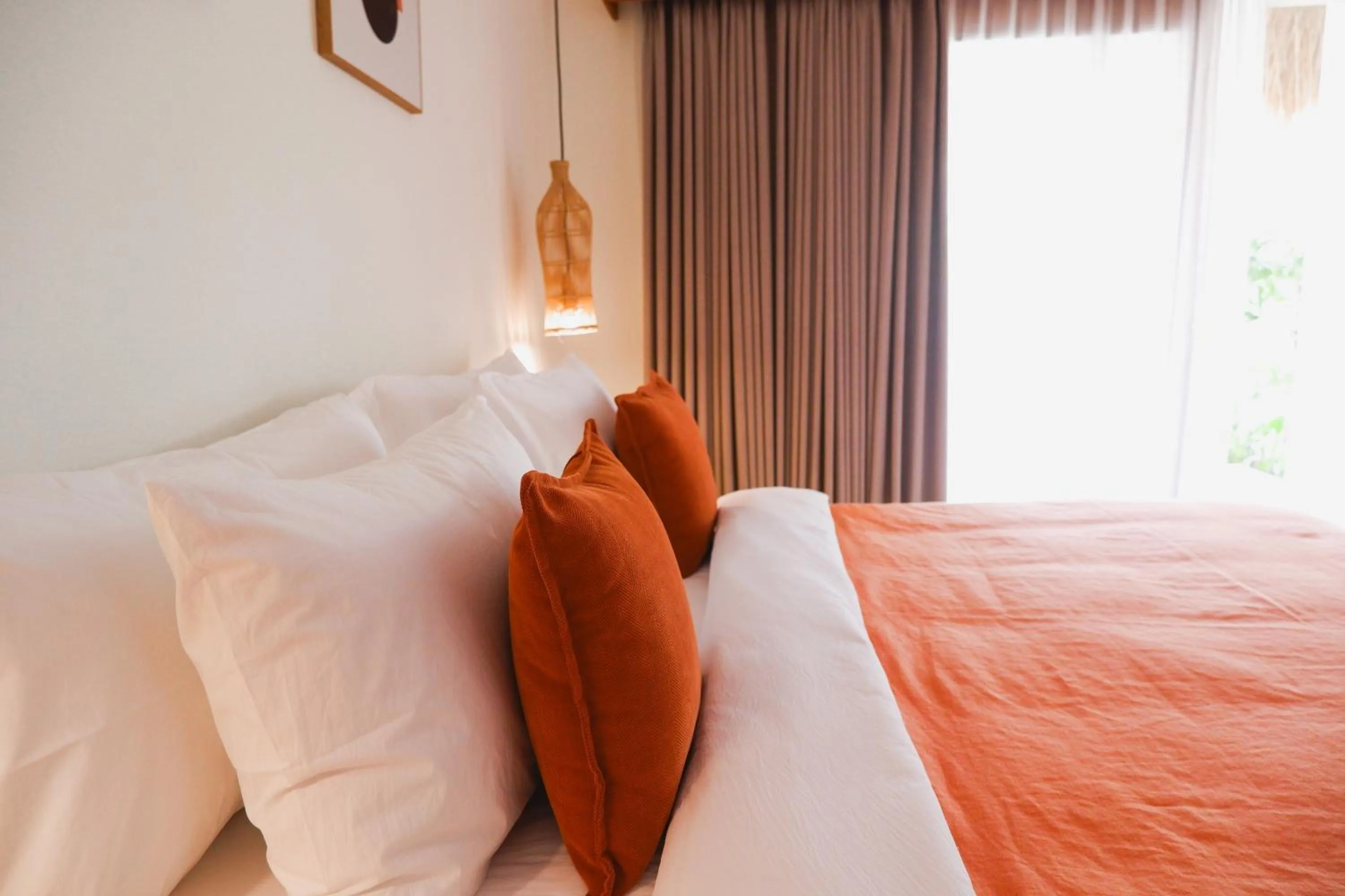 Bed in Reset Lombok Hotel