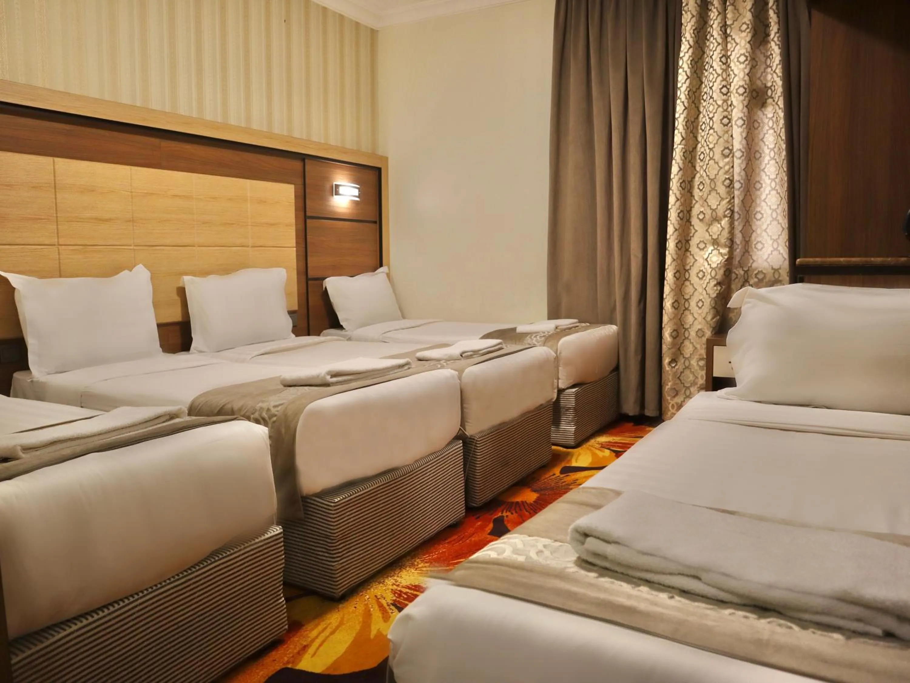 View (from property/room), Bed in Al Mukhtara Almasi Hotel