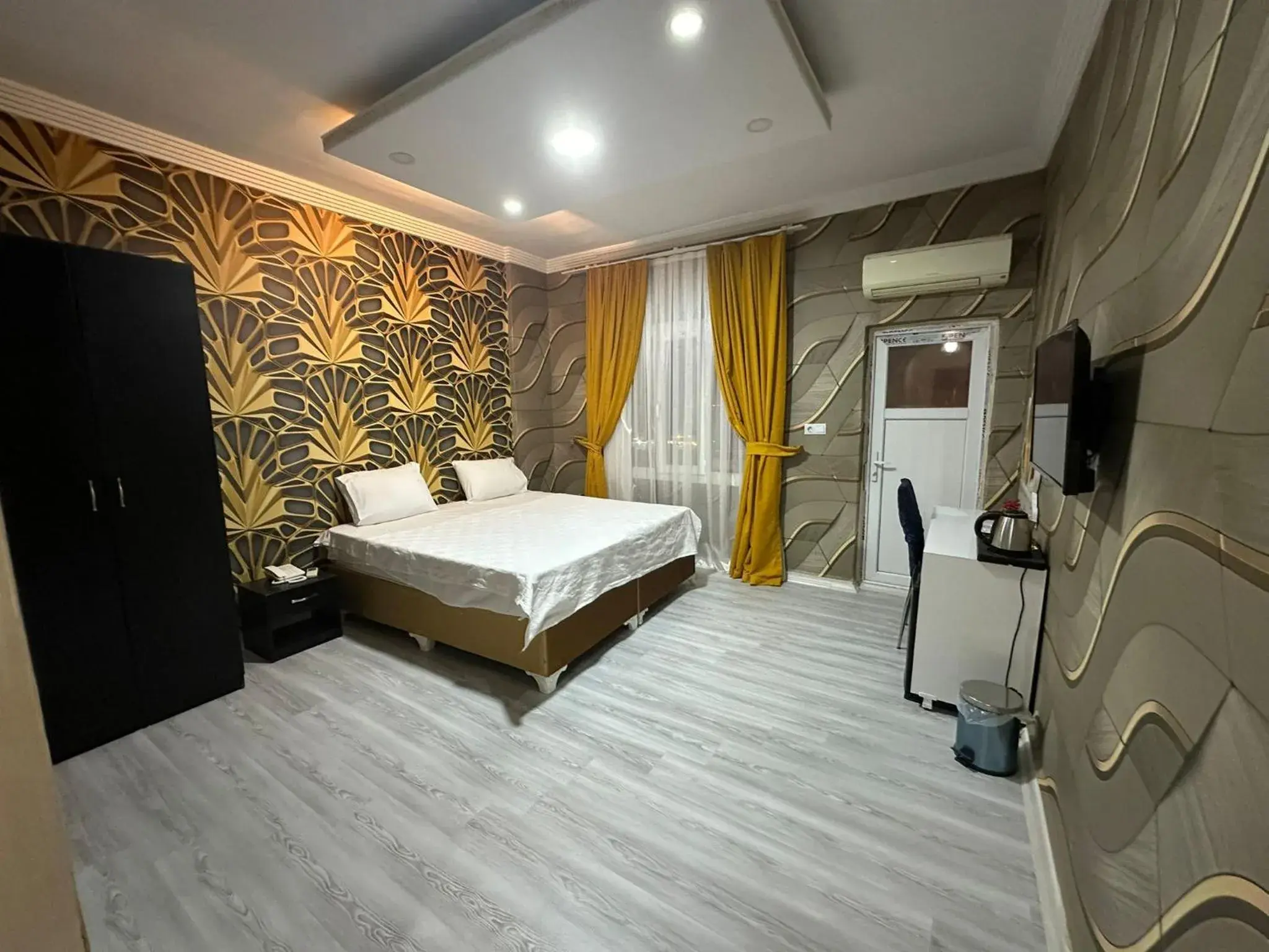 Bed in NUS GRAND HOTEL Bed in NUS GRAND HOTEL