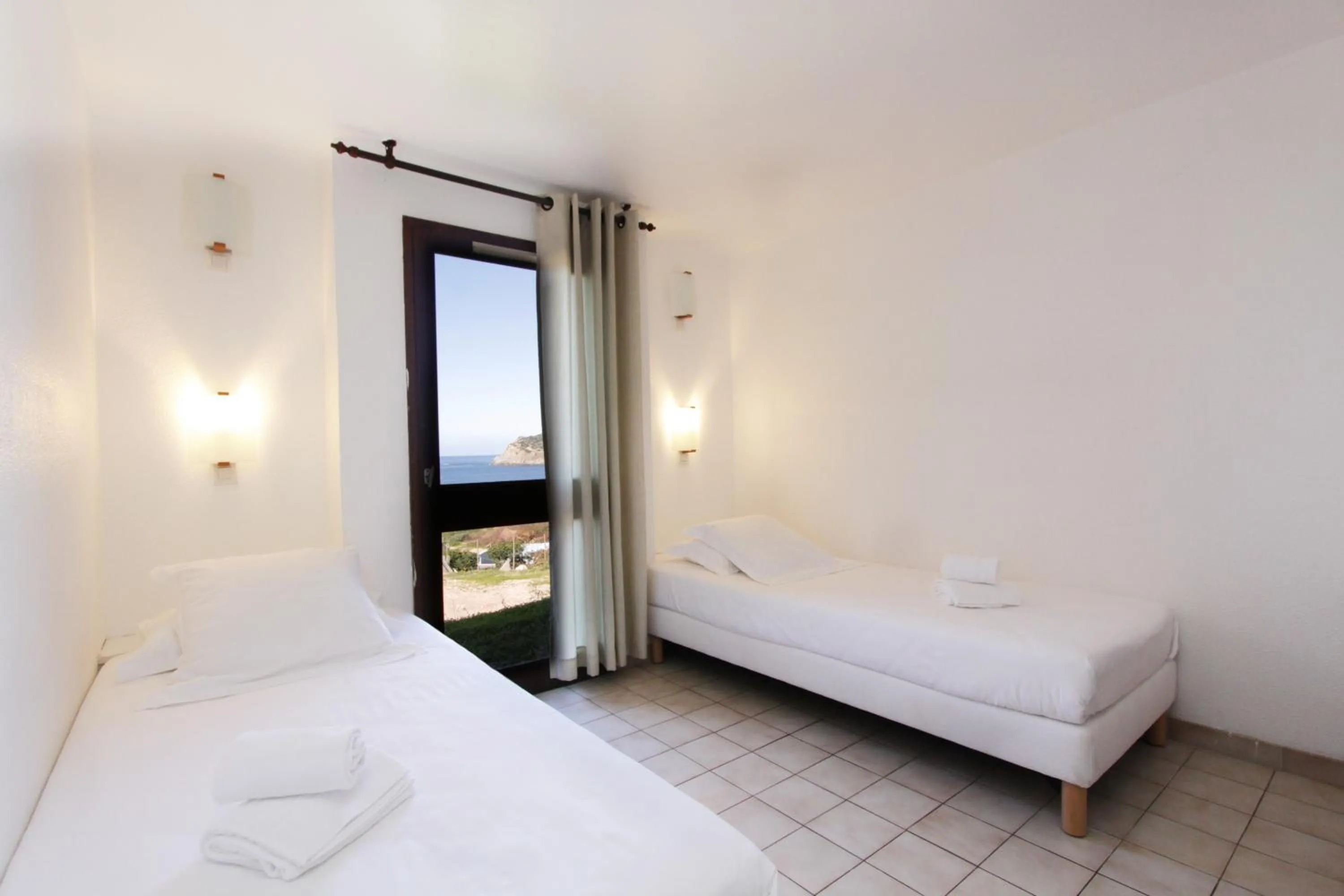Bed in Village de vacances Paese di Lava, Grand Ajaccio