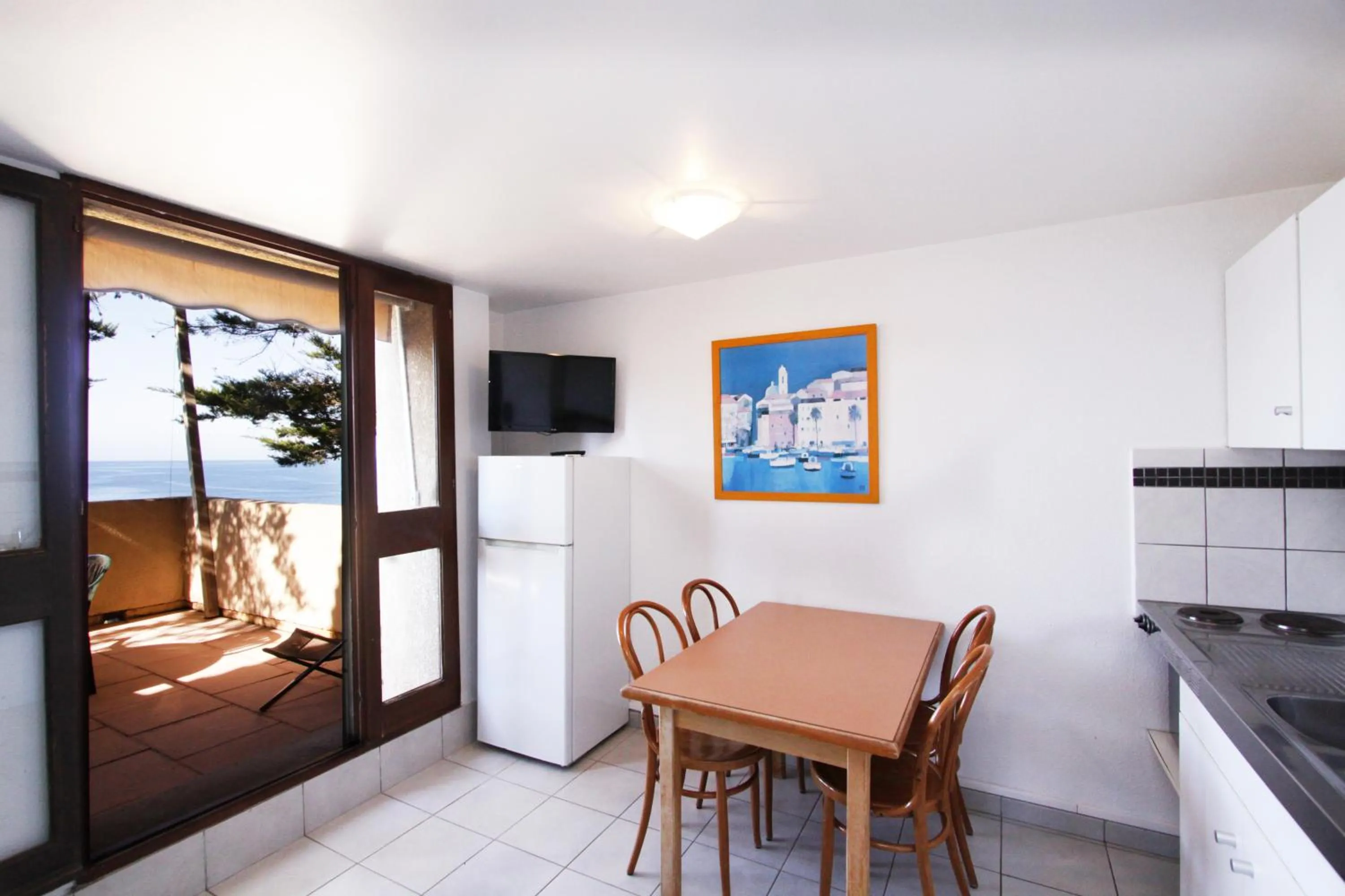 Kitchen or kitchenette in Village de vacances Paese di Lava, Grand Ajaccio