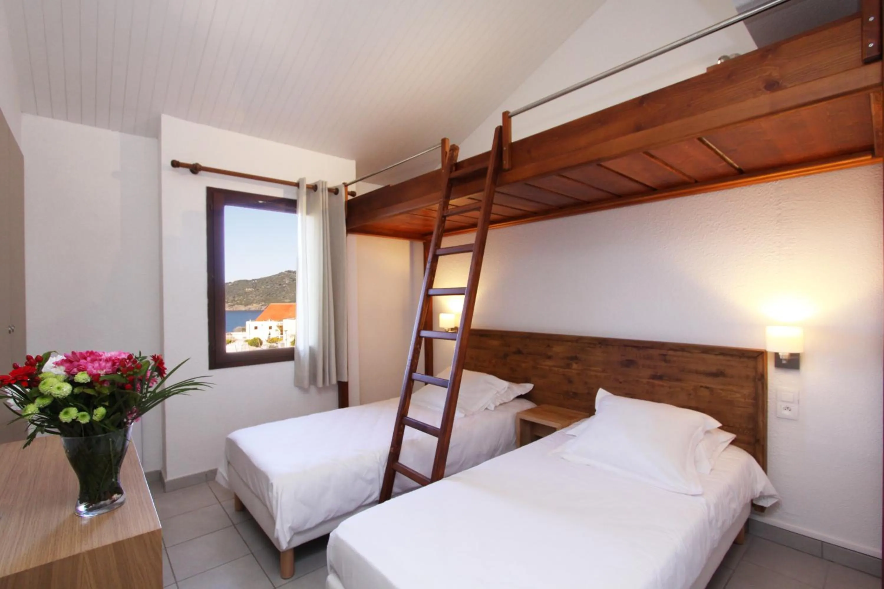 Photo of the whole room, Bed in Village de vacances Paese di Lava, Grand Ajaccio