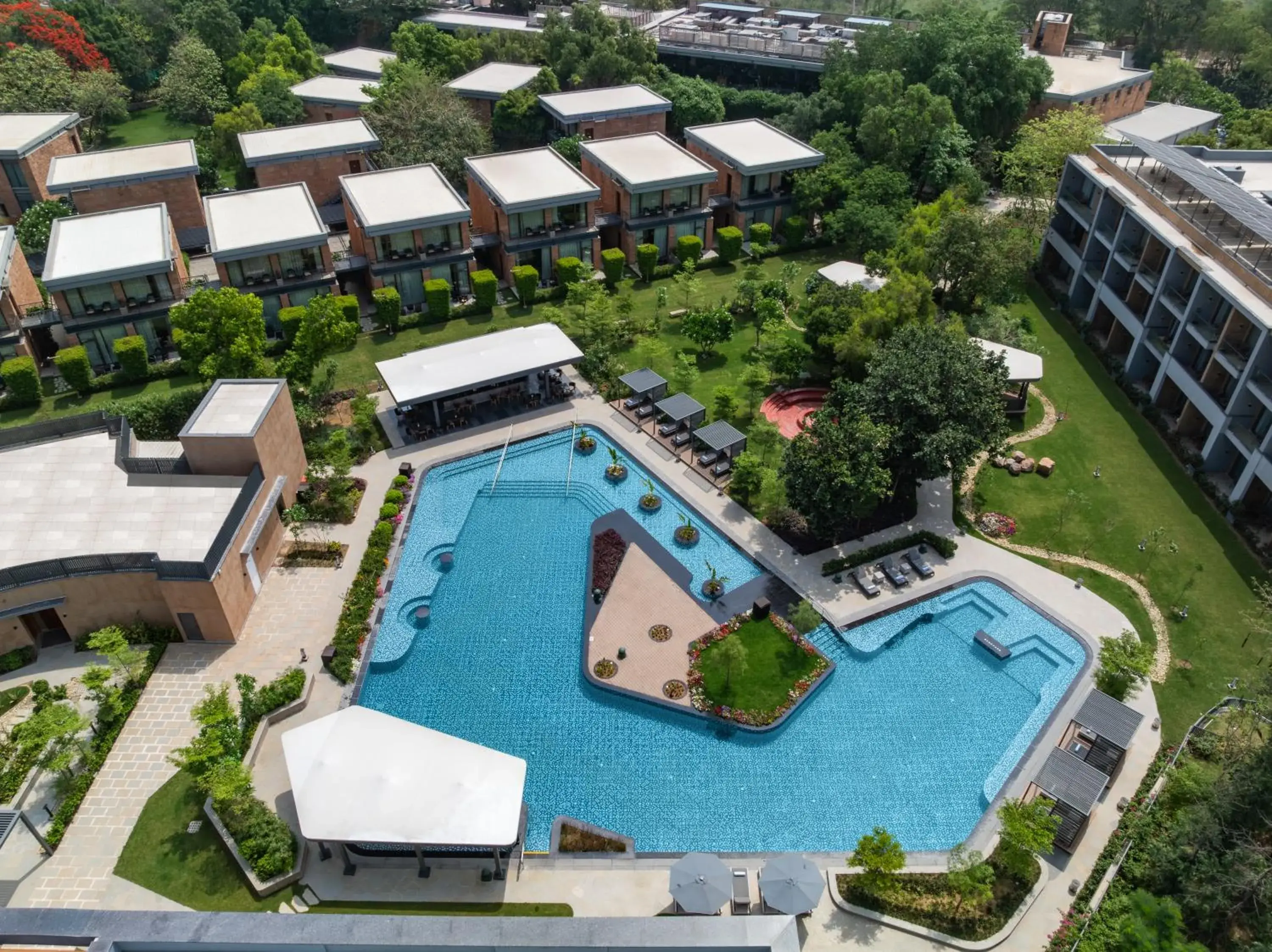 Swimming pool in Taj Damdama Lake Resort & Spa, Gurugram Swimming pool in Taj Damdama Lake Resort & Spa, Gurugram