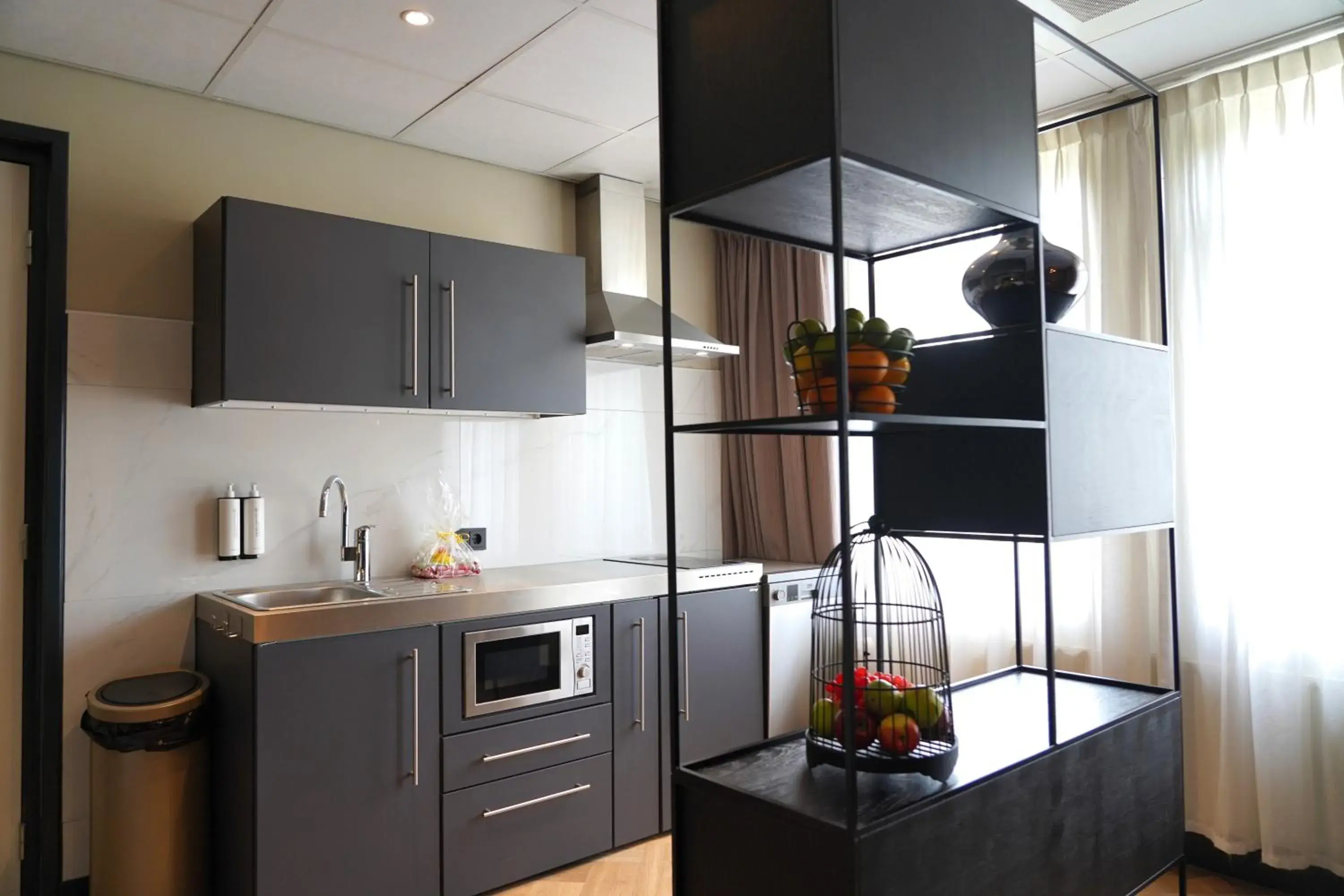 Kitchen or kitchenette in Hotel Alkmaar - Bar & Restaurant Kitchen or kitchenette in Hotel Alkmaar - Bar & Restaurant
