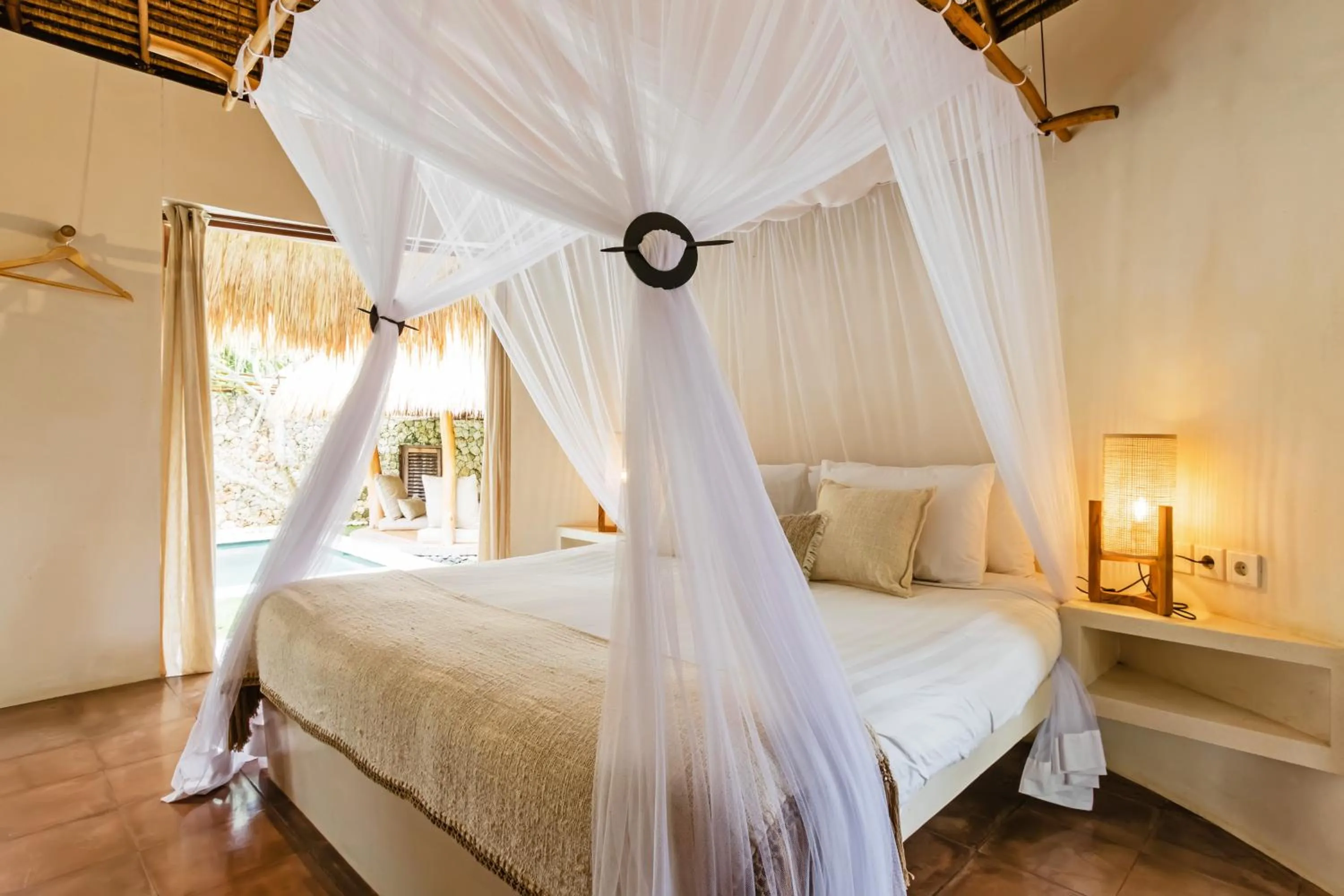 Bed in Acacia Bungalows Bingin