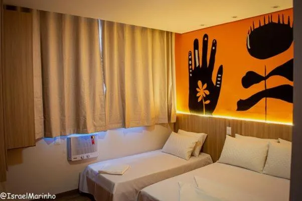 Photo of the whole room in Pousada Boutique Raio de Luz