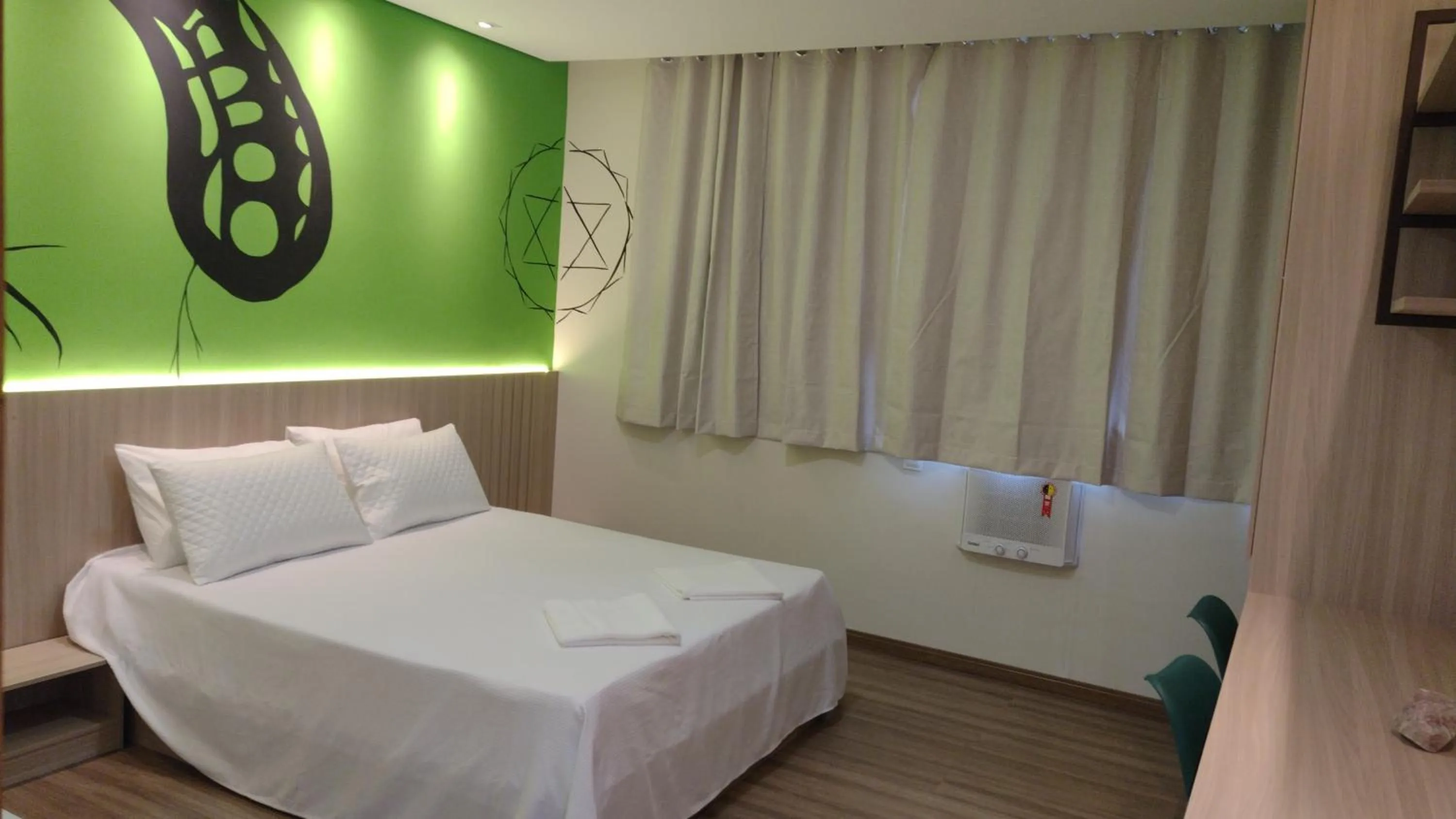 Photo of the whole room in Pousada Boutique Raio de Luz