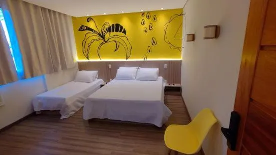 Photo of the whole room in Pousada Boutique Raio de Luz