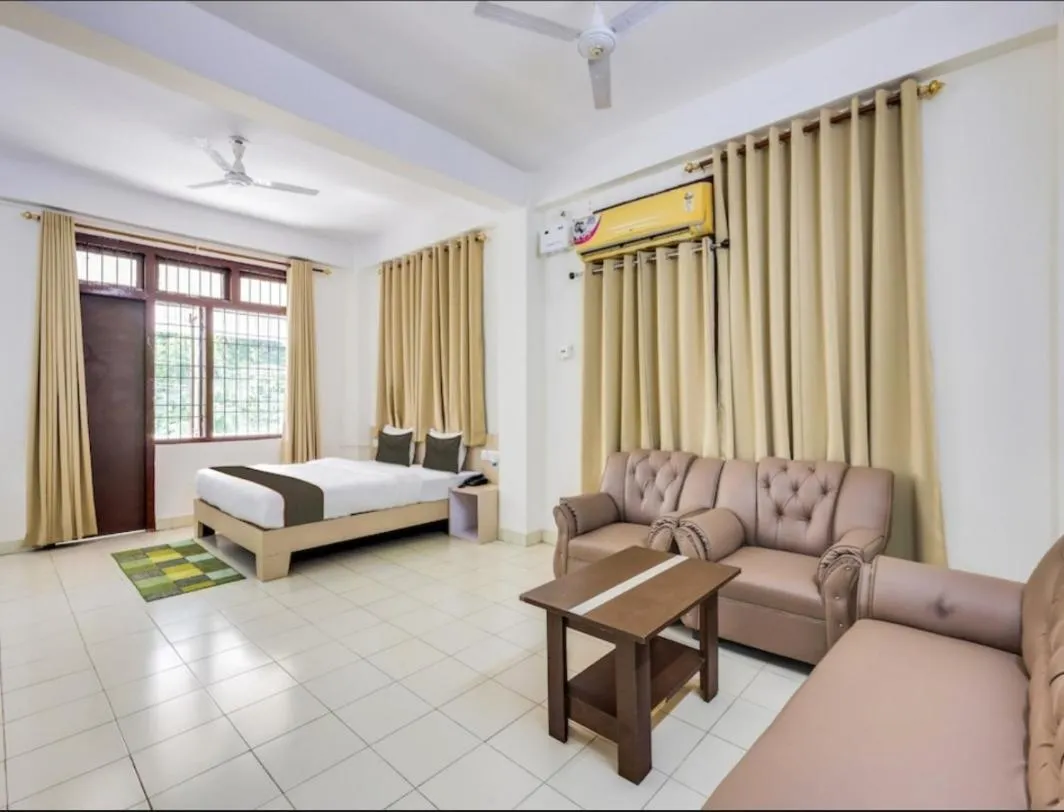 Bed, Seating Area in ERICA RESIDENCY