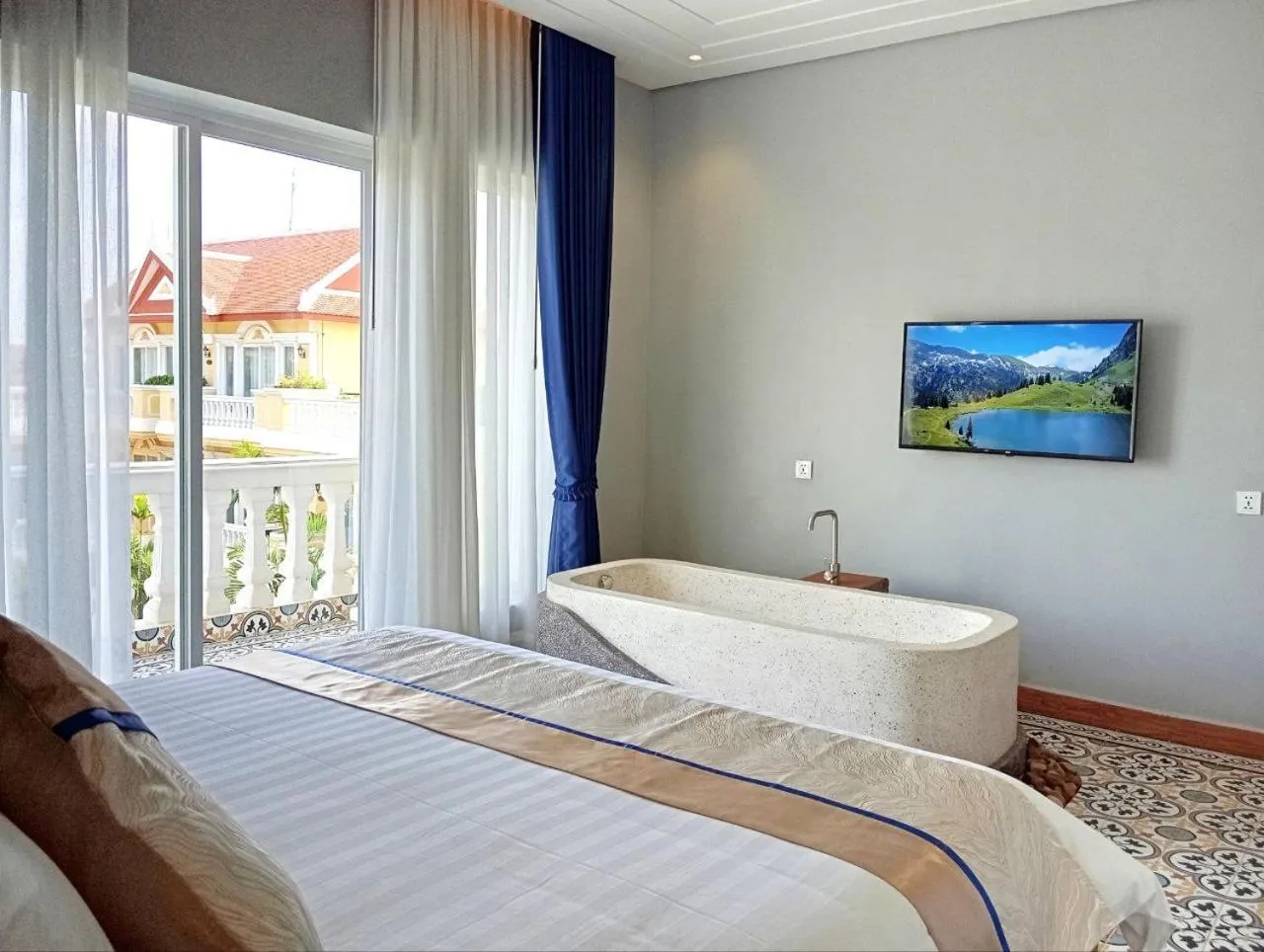 Photo of the whole room, Bed in Sokchea Kampot Hotel