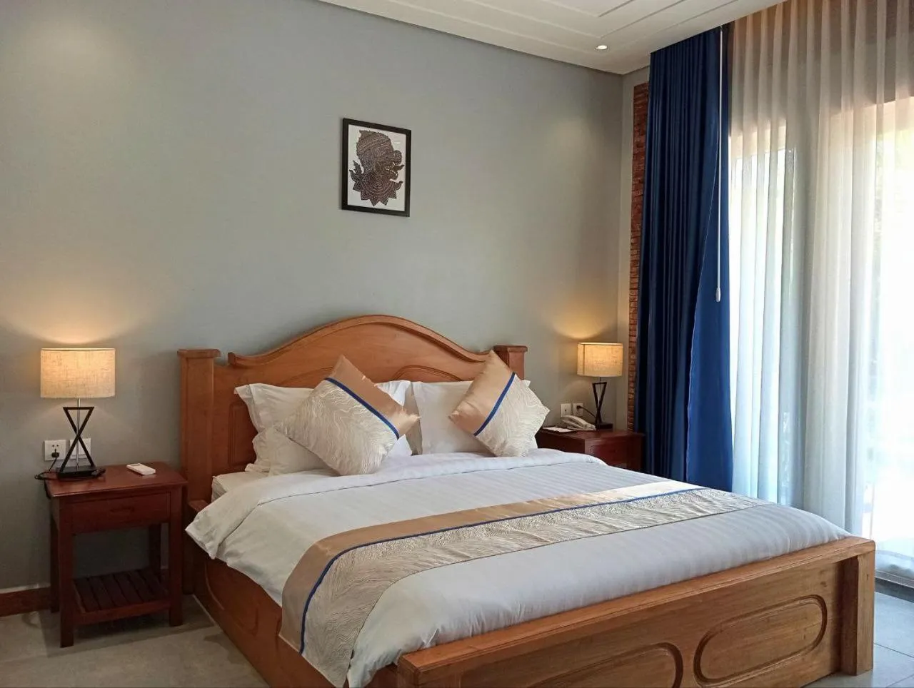 Bed in Sokchea Kampot Hotel