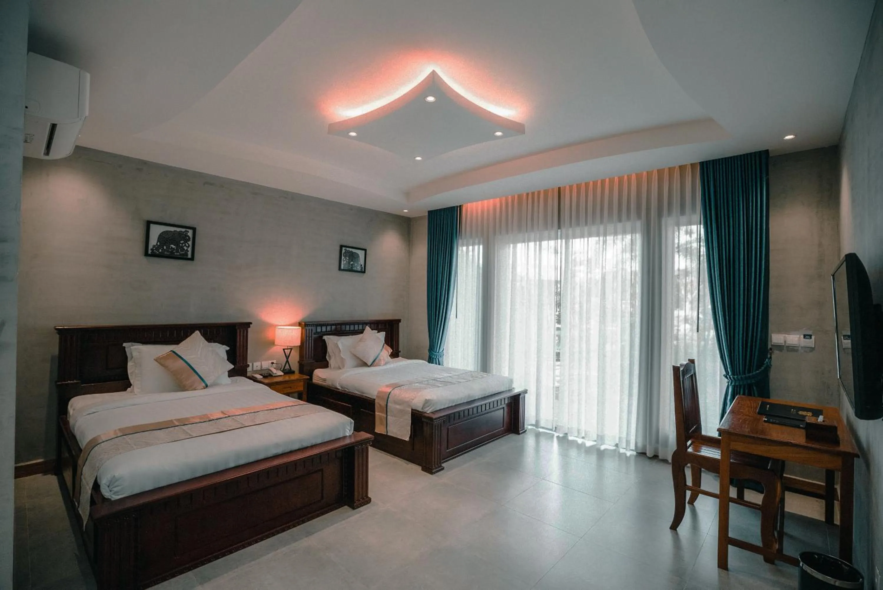 Bed in Sokchea Kampot Hotel