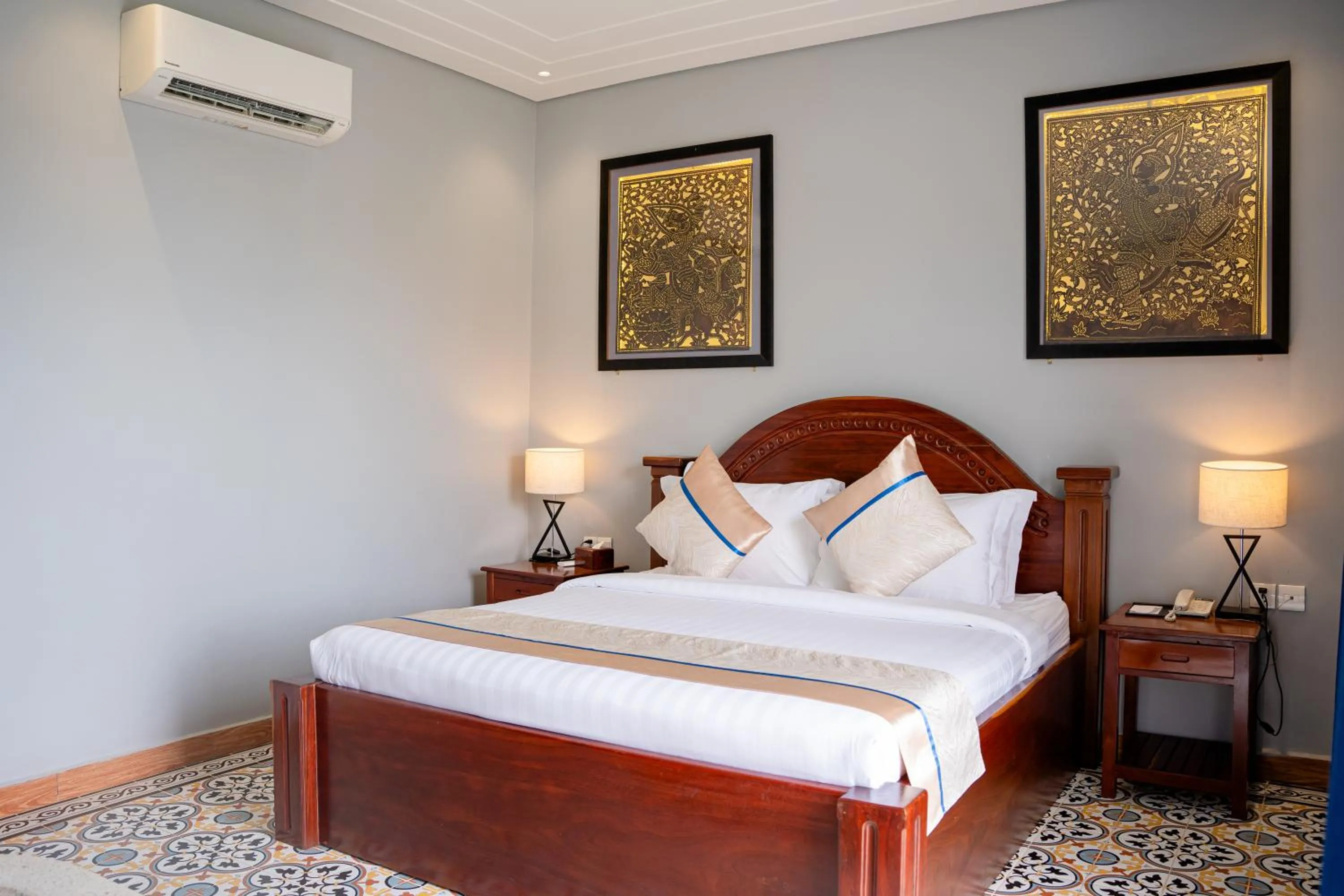 Bed in Sokchea Kampot Hotel