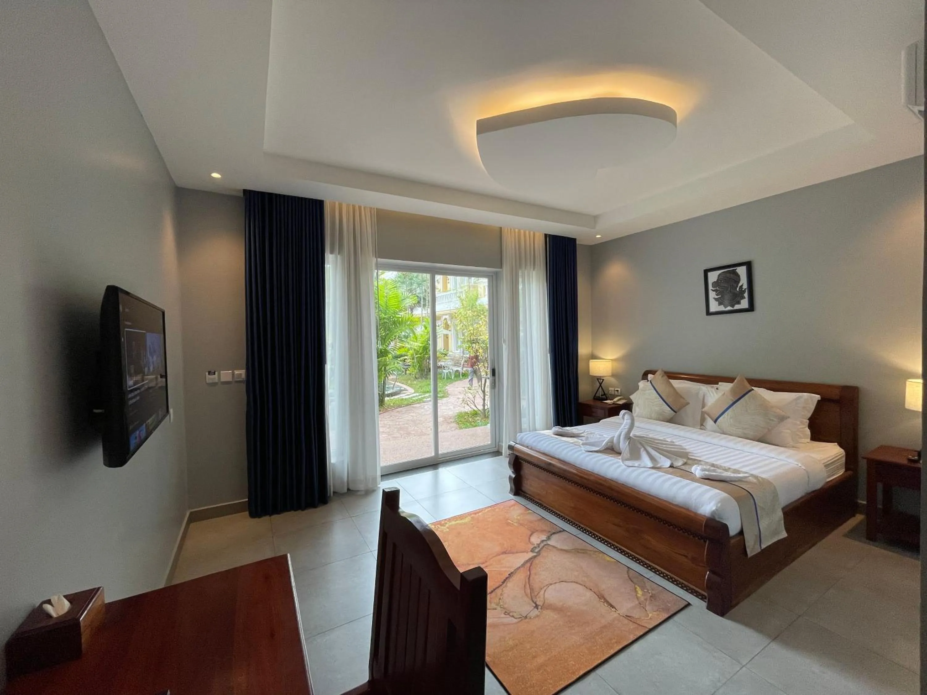 Bed in Sokchea Kampot Hotel