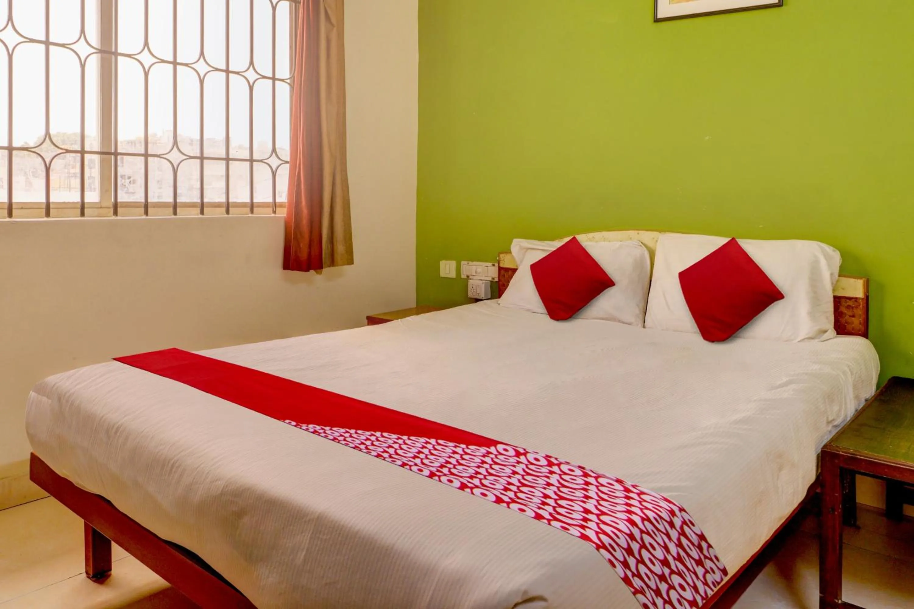 Bedroom, Bed in Hotel O Raj Comforts