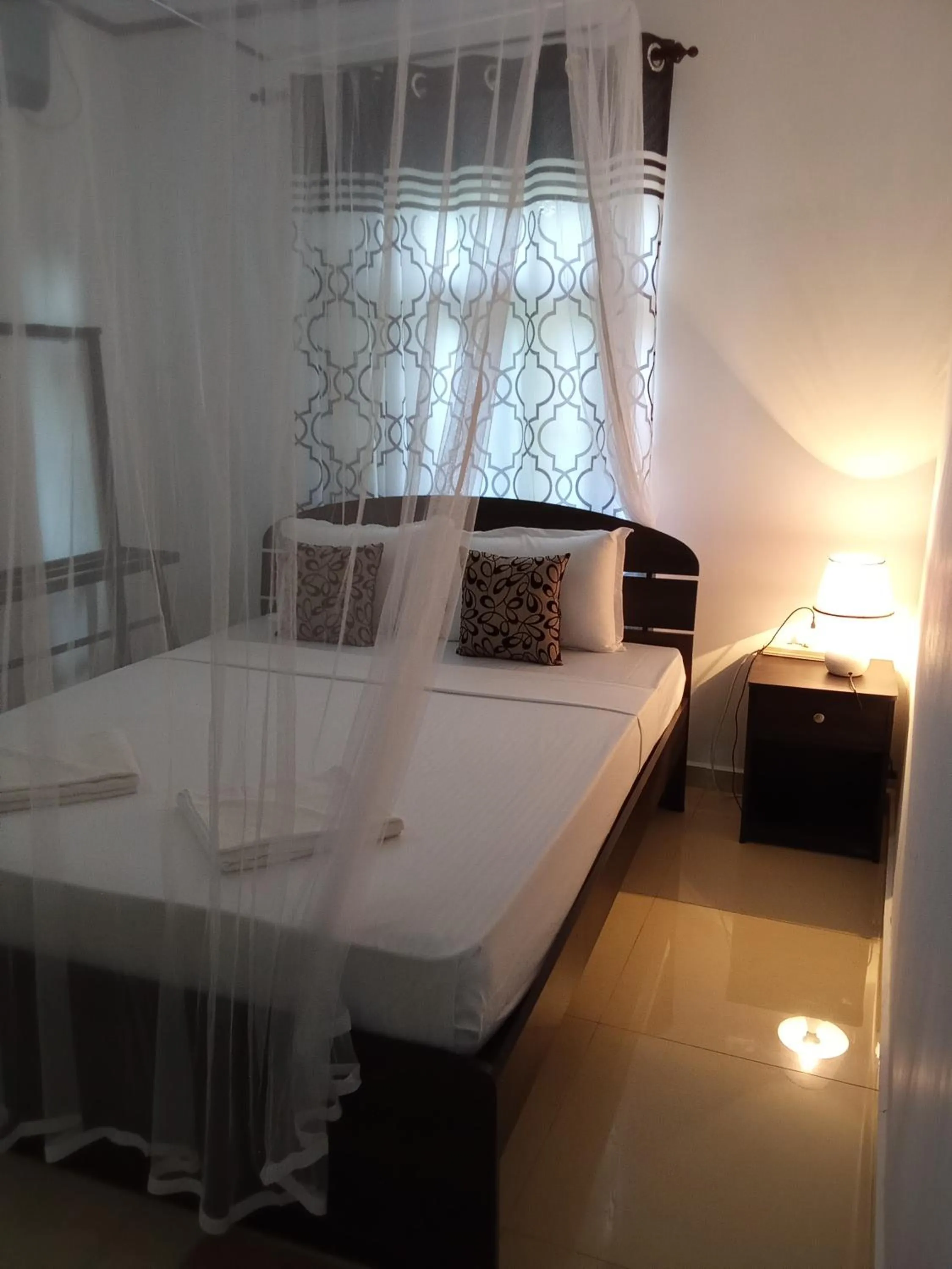 Bed in Kavee Transit Hotel