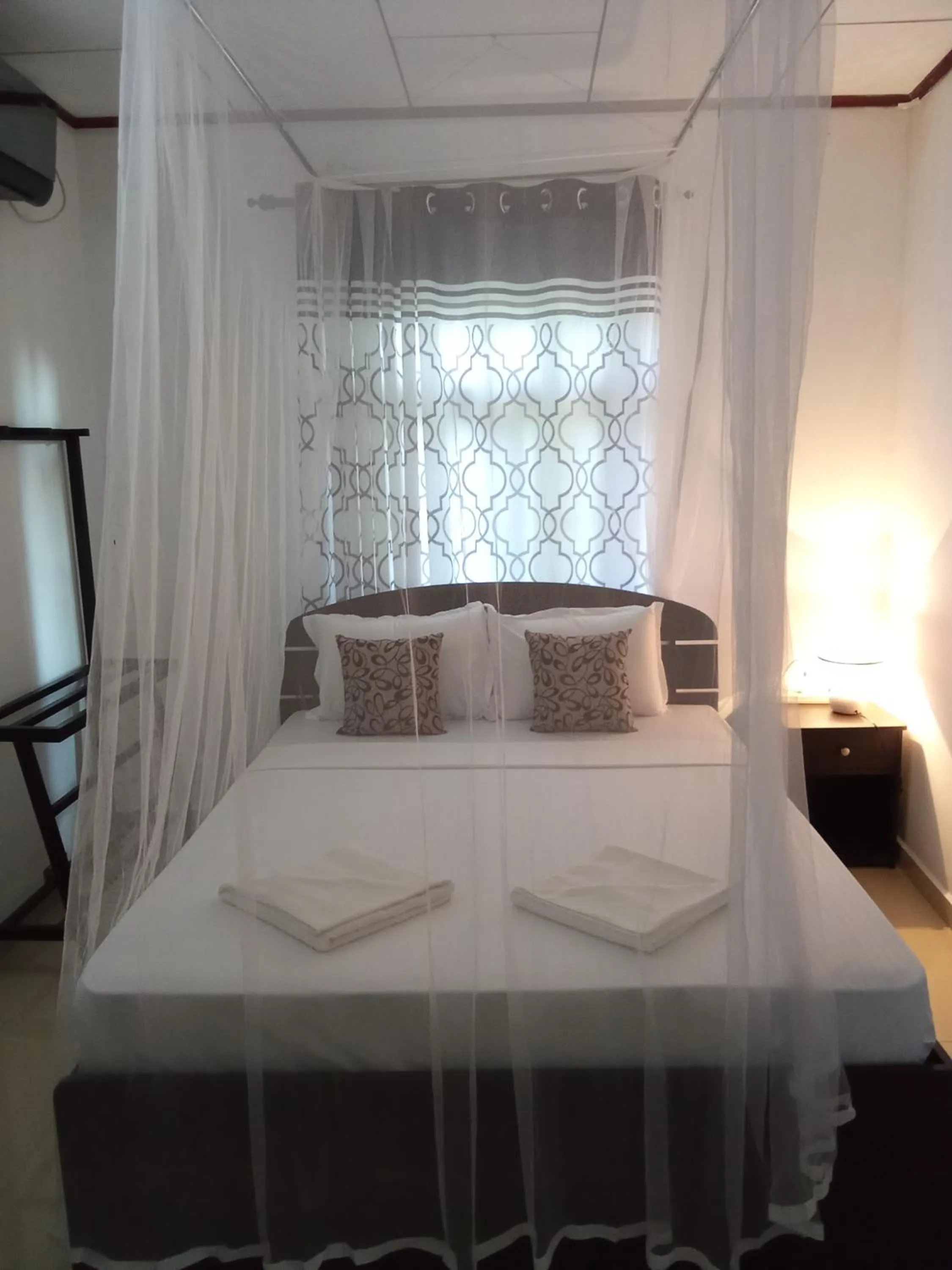 Bed in Kavee Transit Hotel