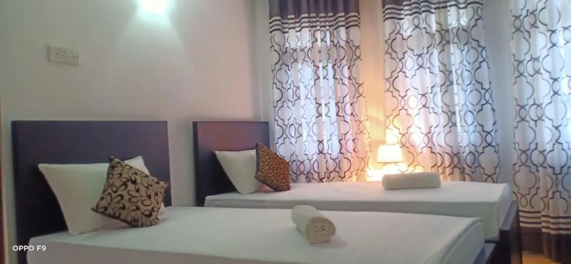 Bed in Kavee Transit Hotel