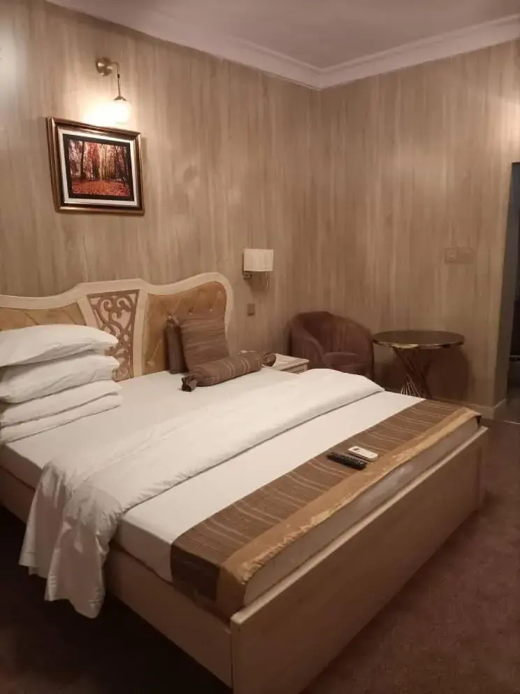 Bed in ERiTH APARTMENT & SUITES Bed in ERiTH APARTMENT & SUITES