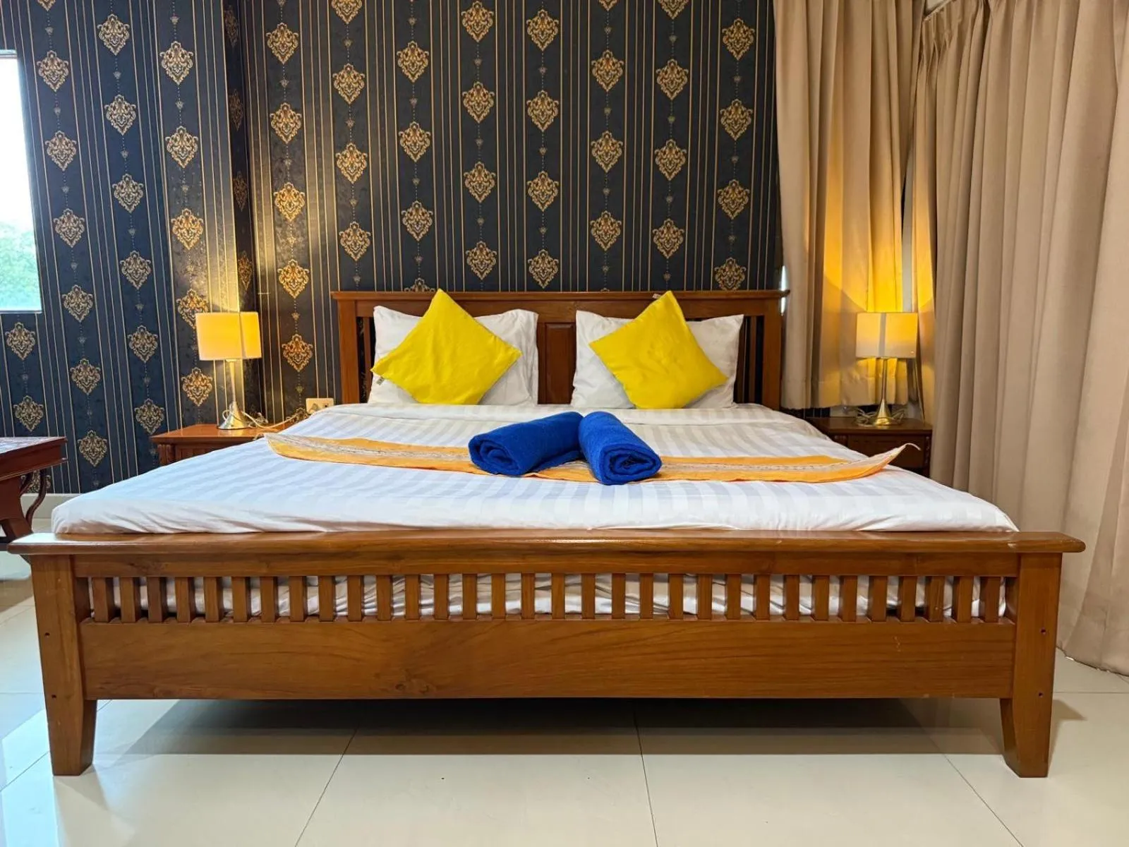 Bed in Royal Sweet Hotel