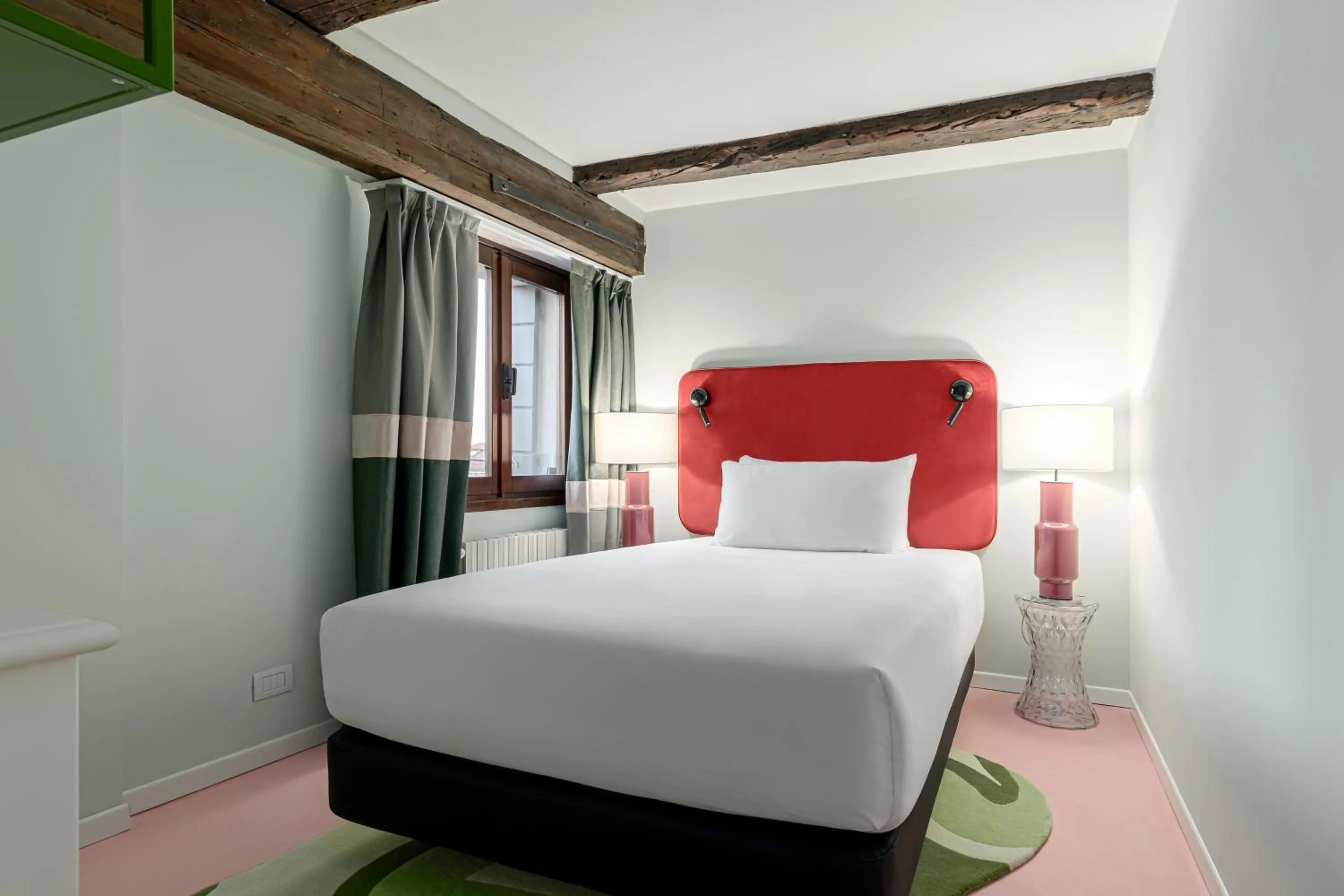 Bed in Palazzo Dei Fiori by Room Mate