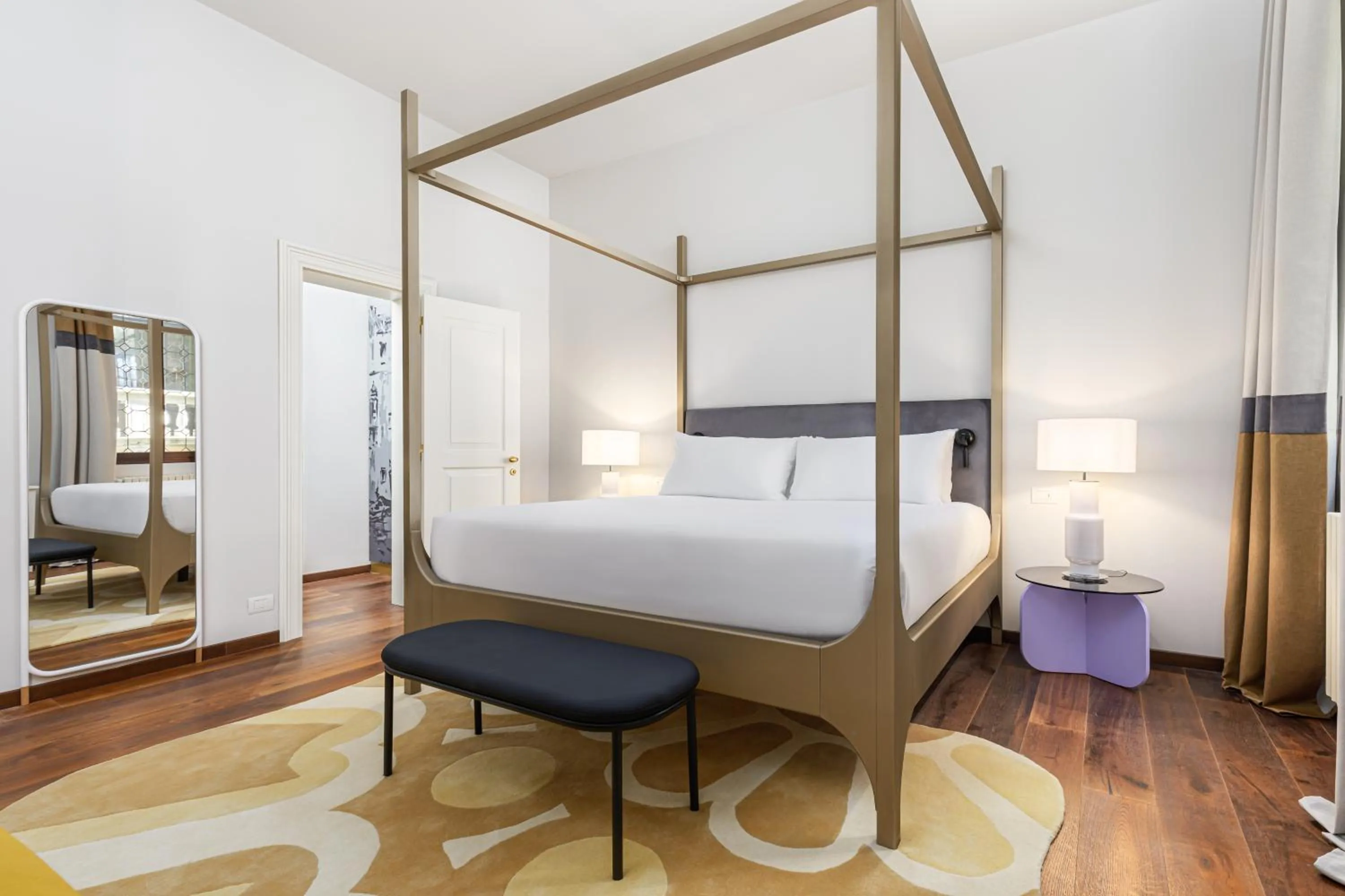 Bed in Palazzo Dei Fiori by Room Mate