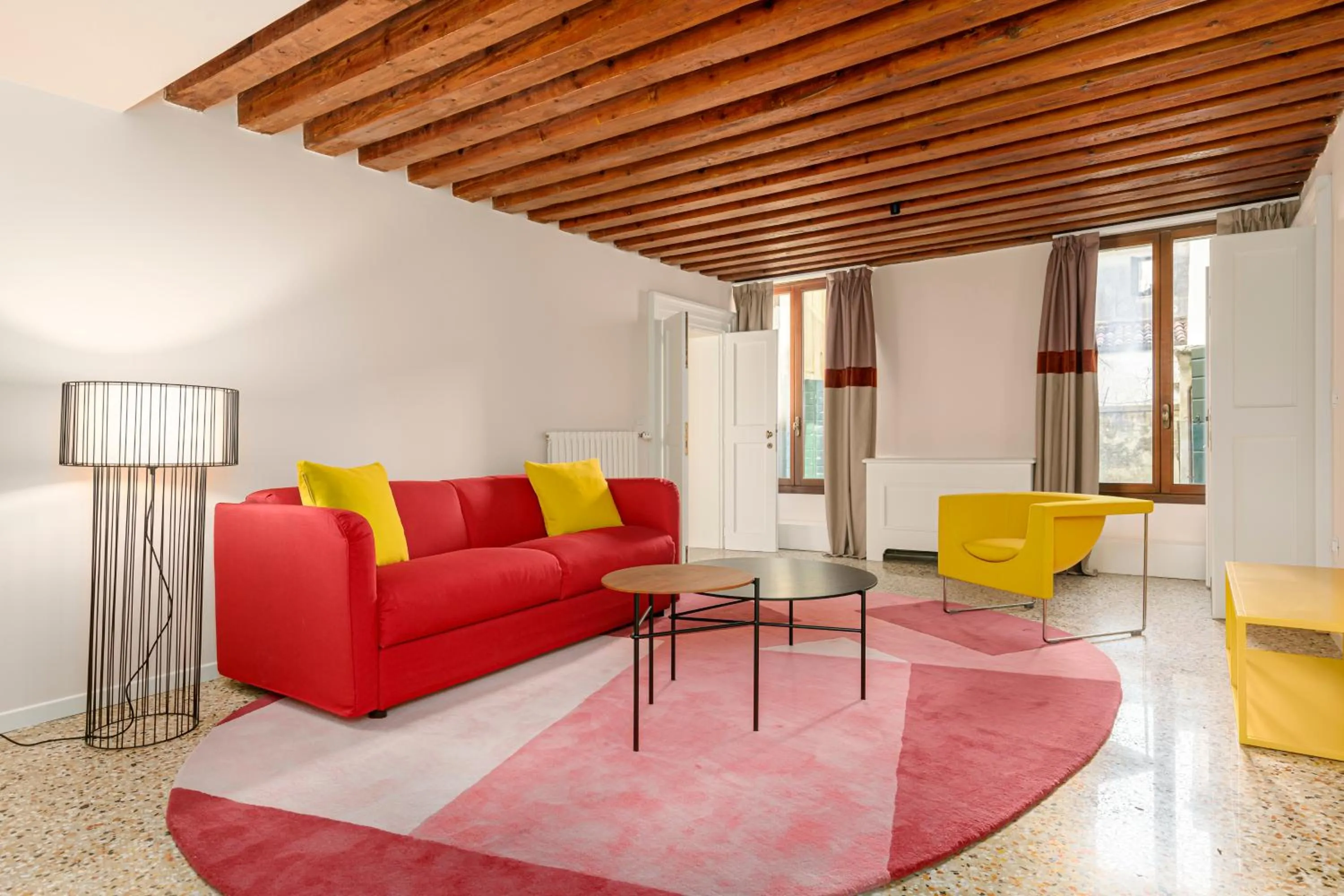 Living room in Palazzo Dei Fiori by Room Mate