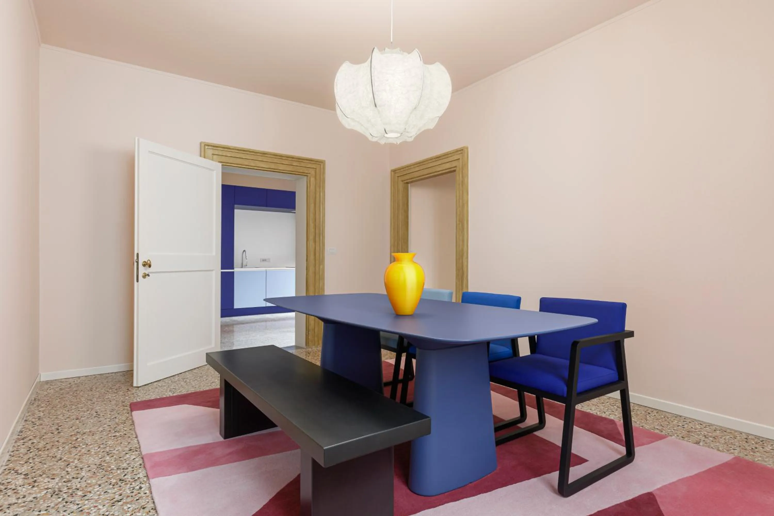 Dining area in Palazzo Dei Fiori by Room Mate