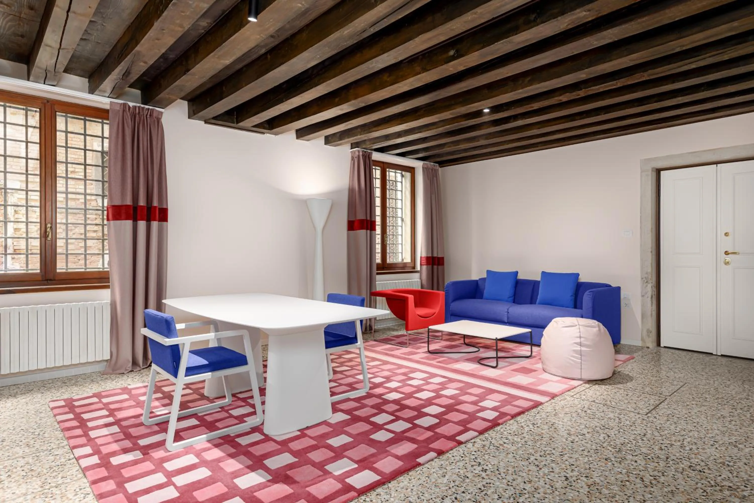 Seating area in Palazzo Dei Fiori by Room Mate