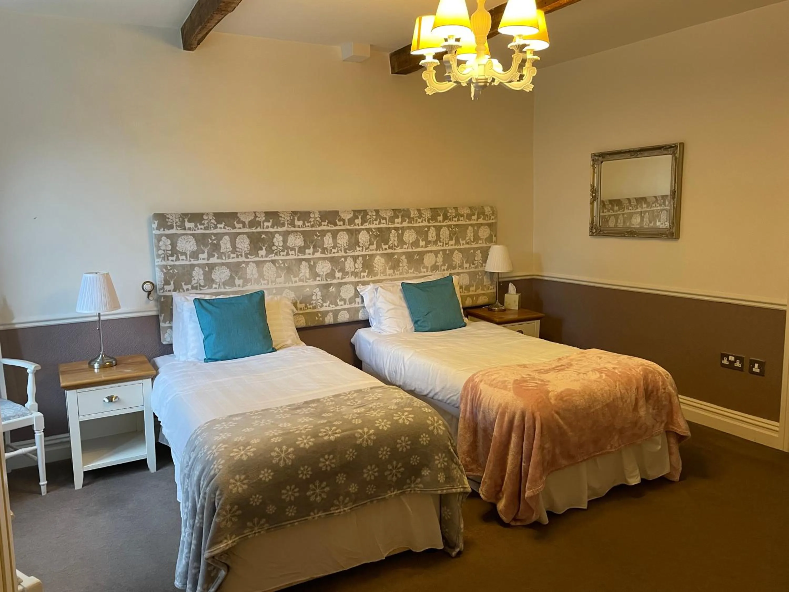 Bed in New Inn Hotel