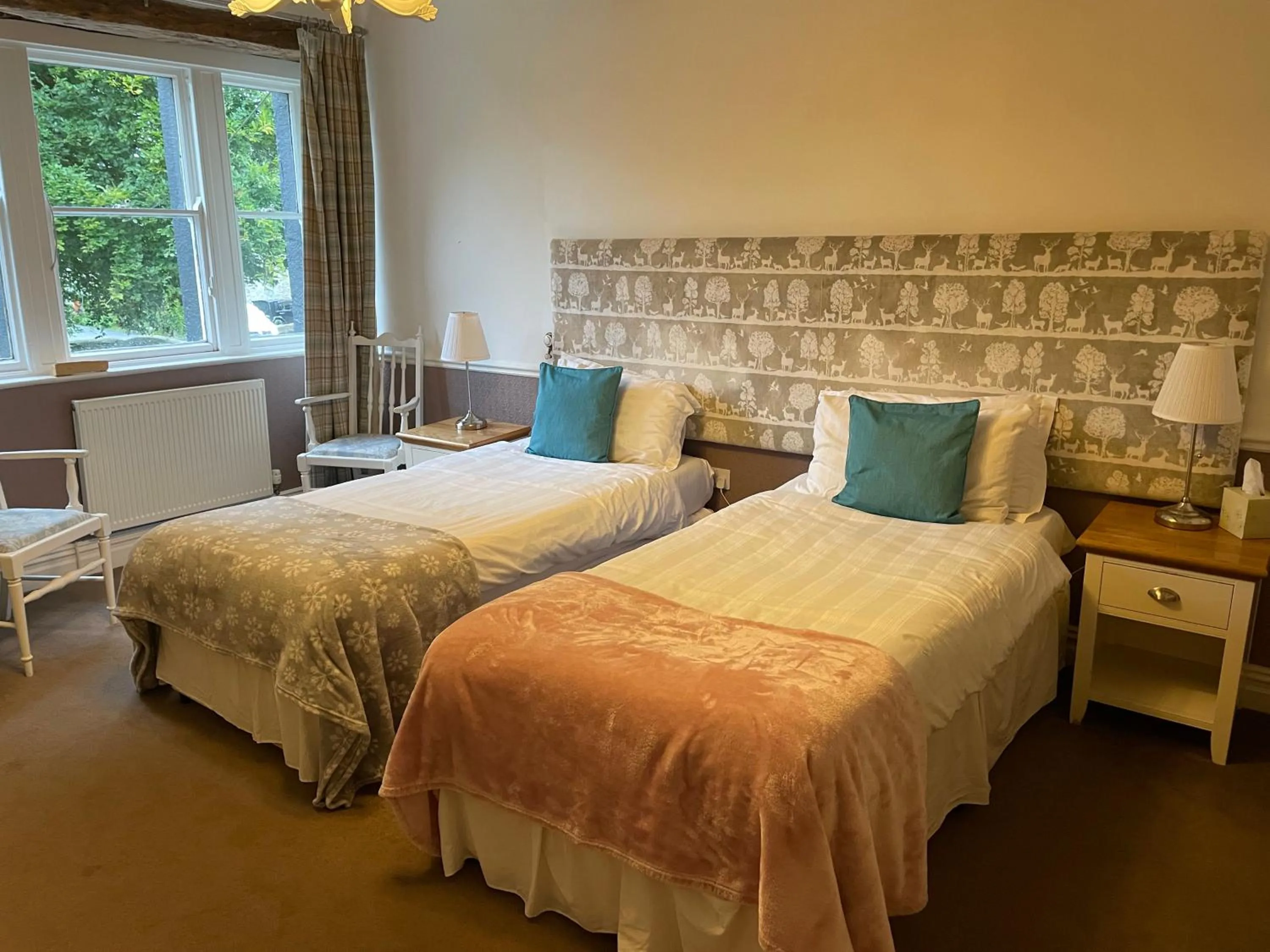 Photo of the whole room, Bed in New Inn Hotel