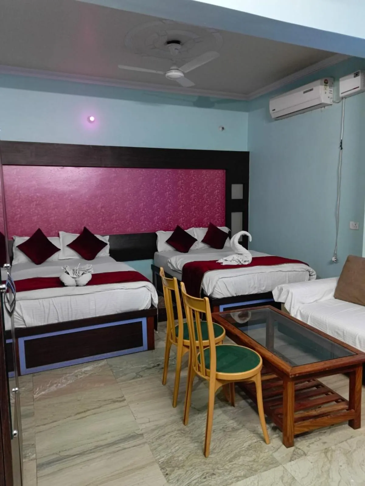 Bed in Hotel Nirmala Inn