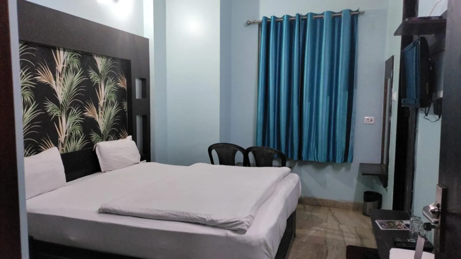 Bed in Hotel Nirmala Inn