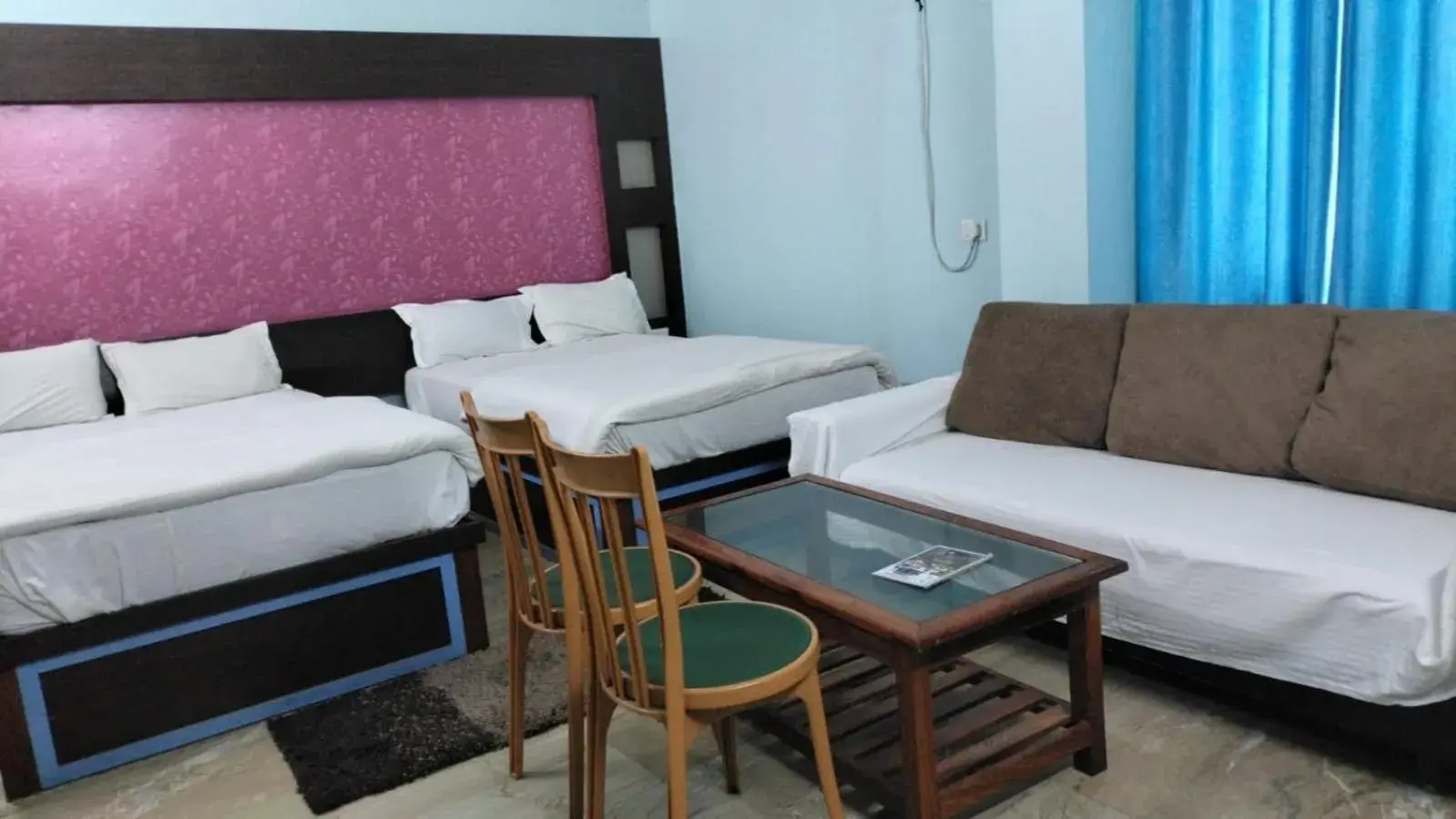 Bed in Hotel Nirmala Inn Bed in Hotel Nirmala Inn