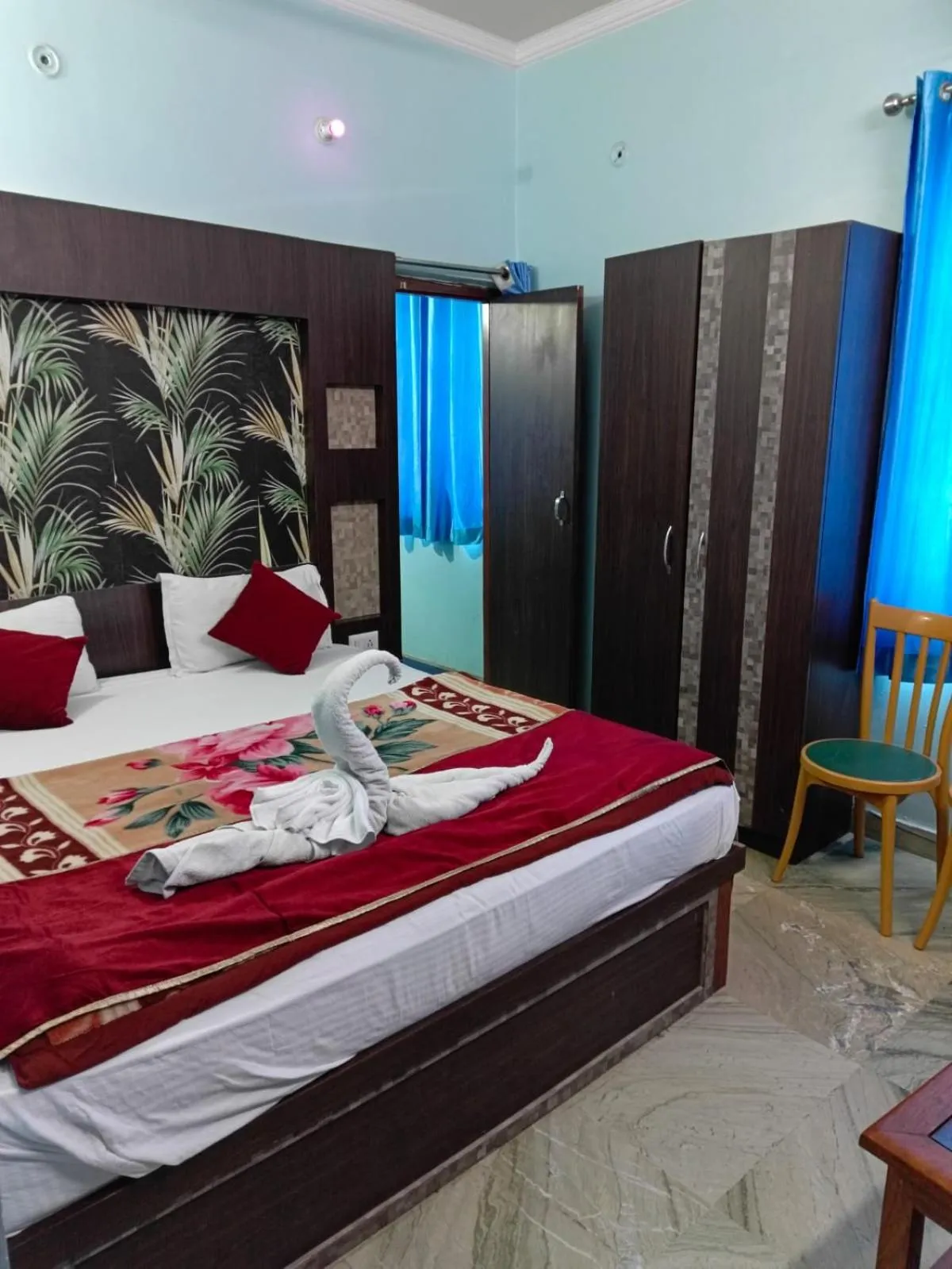 Bed in Hotel Nirmala Inn