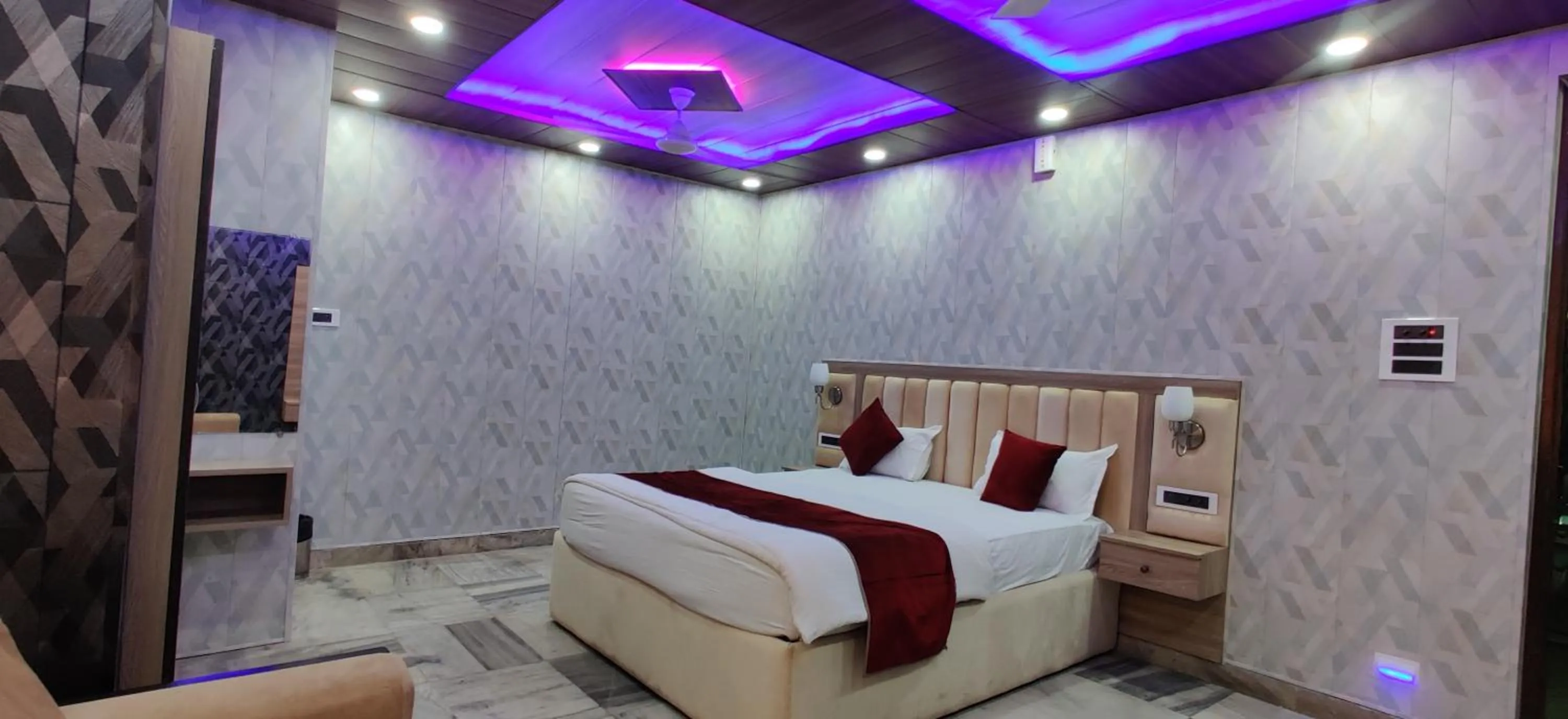 Bed in Hotel Nirmala Inn