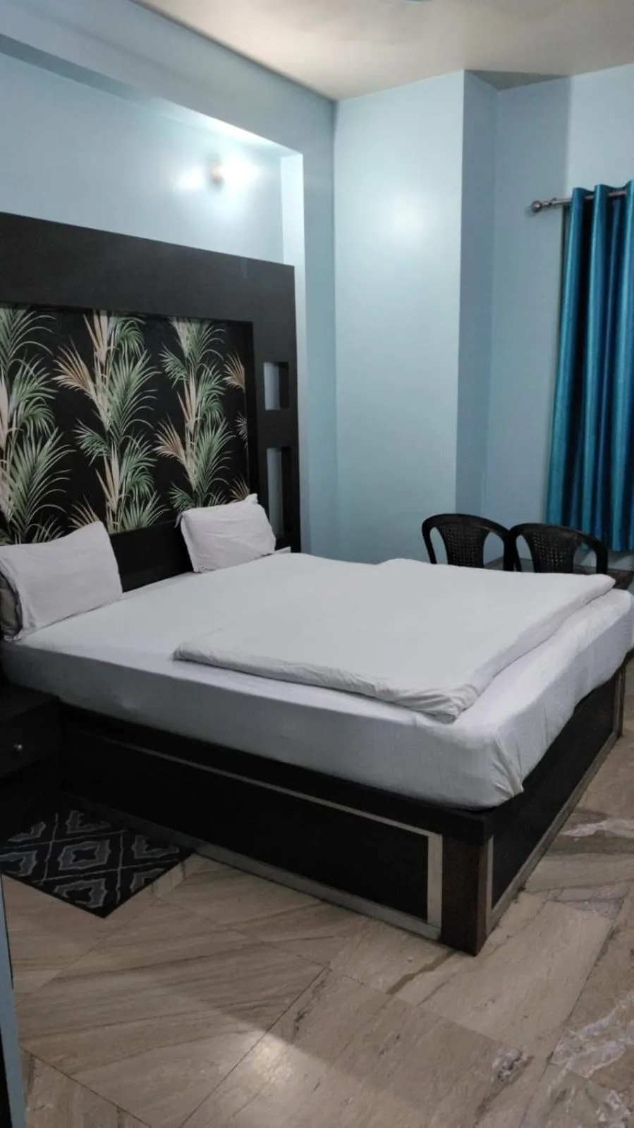 Bed in Hotel Nirmala Inn