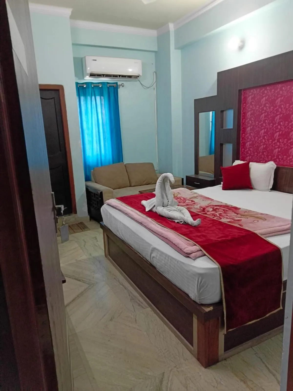 Bed in Hotel Nirmala Inn