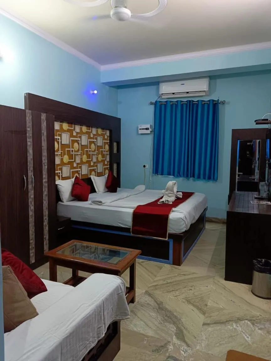 Bed in Hotel Nirmala Inn