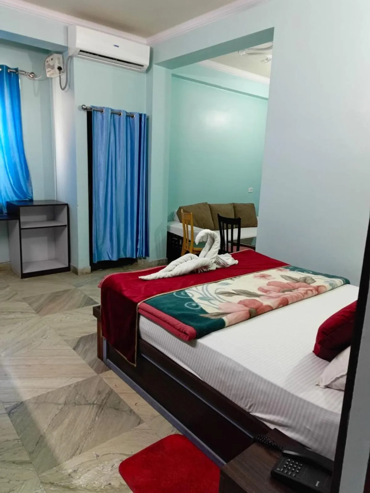 Living room, Bed in Hotel Nirmala Inn